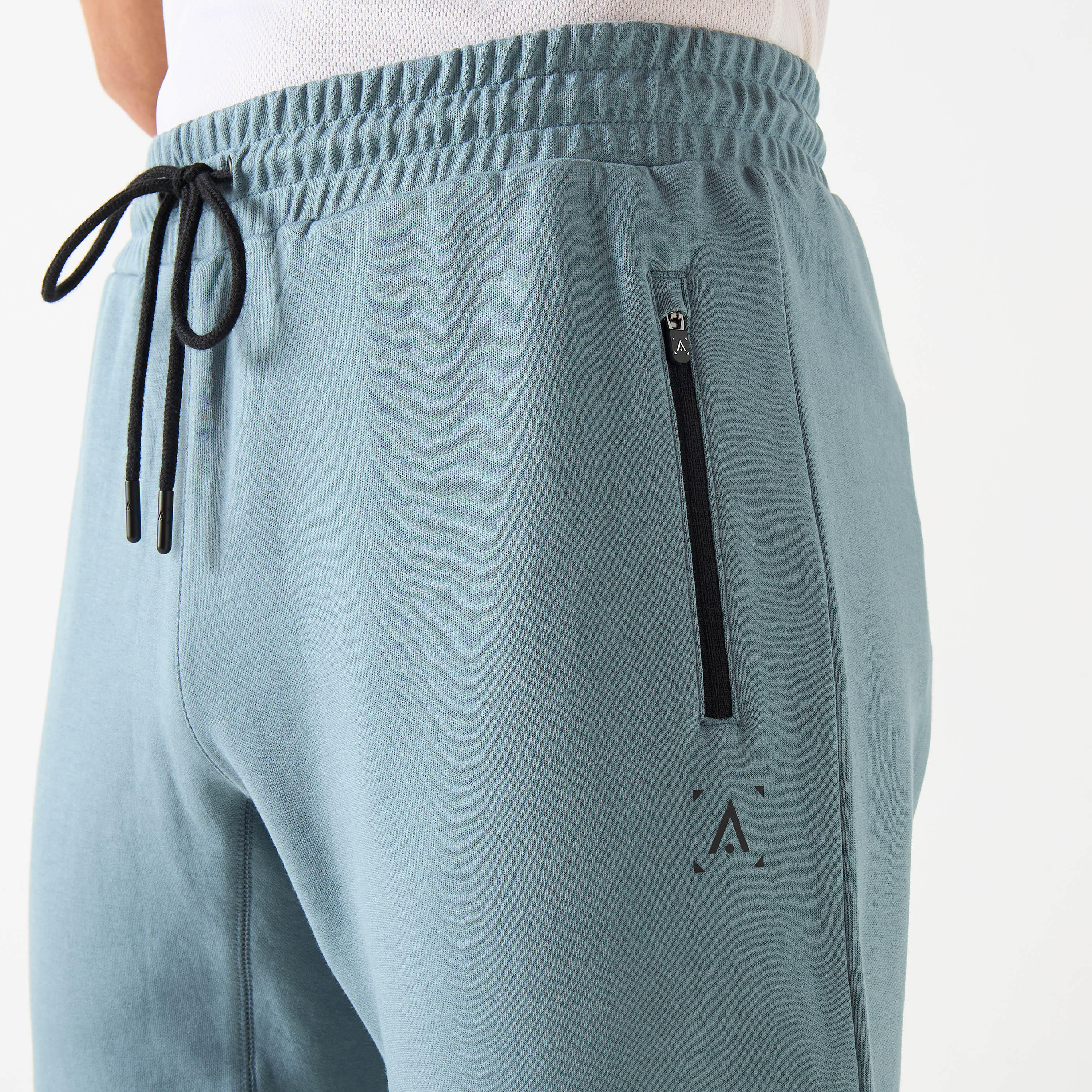 بنطلون رياضي بخصر مطاطي وجيوب-men-clothing-sportswearandactivewear-bottoms-image-4