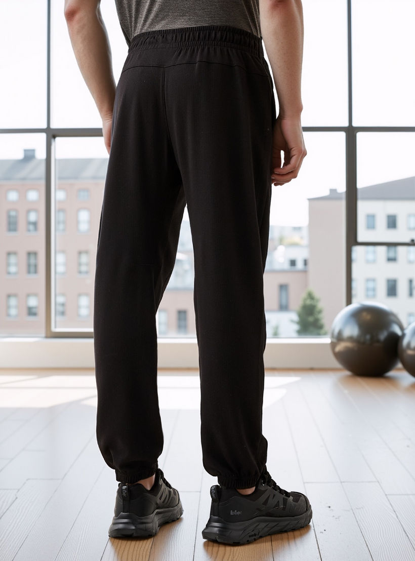 بنطلون رياضي بقصة عادية مع رباط إغلاق-men-clothing-sportswearandactivewear-tracksuits-image-3