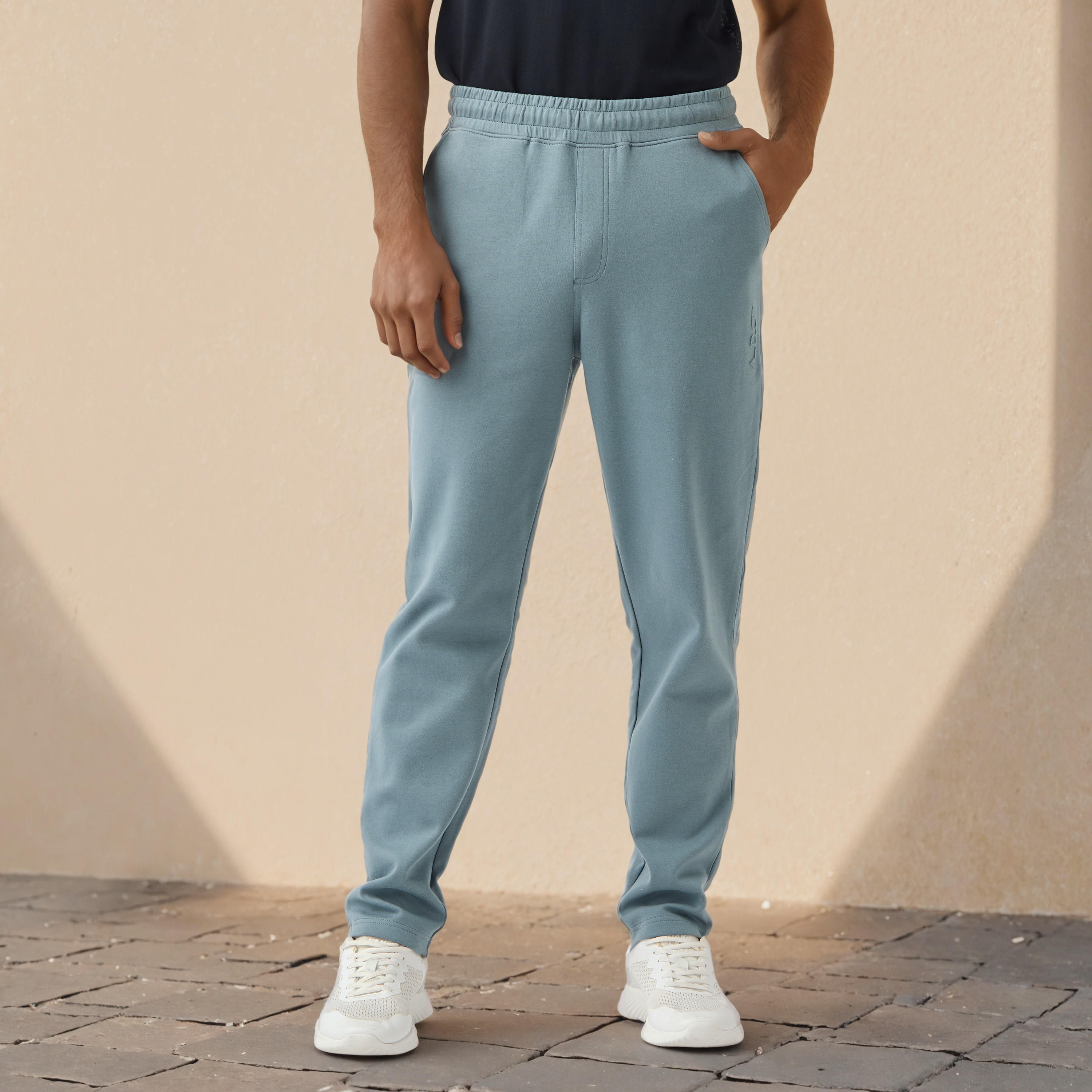 Embossed Logo Track Pants with Pockets-men-clothing-sportswearandactivewear-bottoms-joggers-image-1