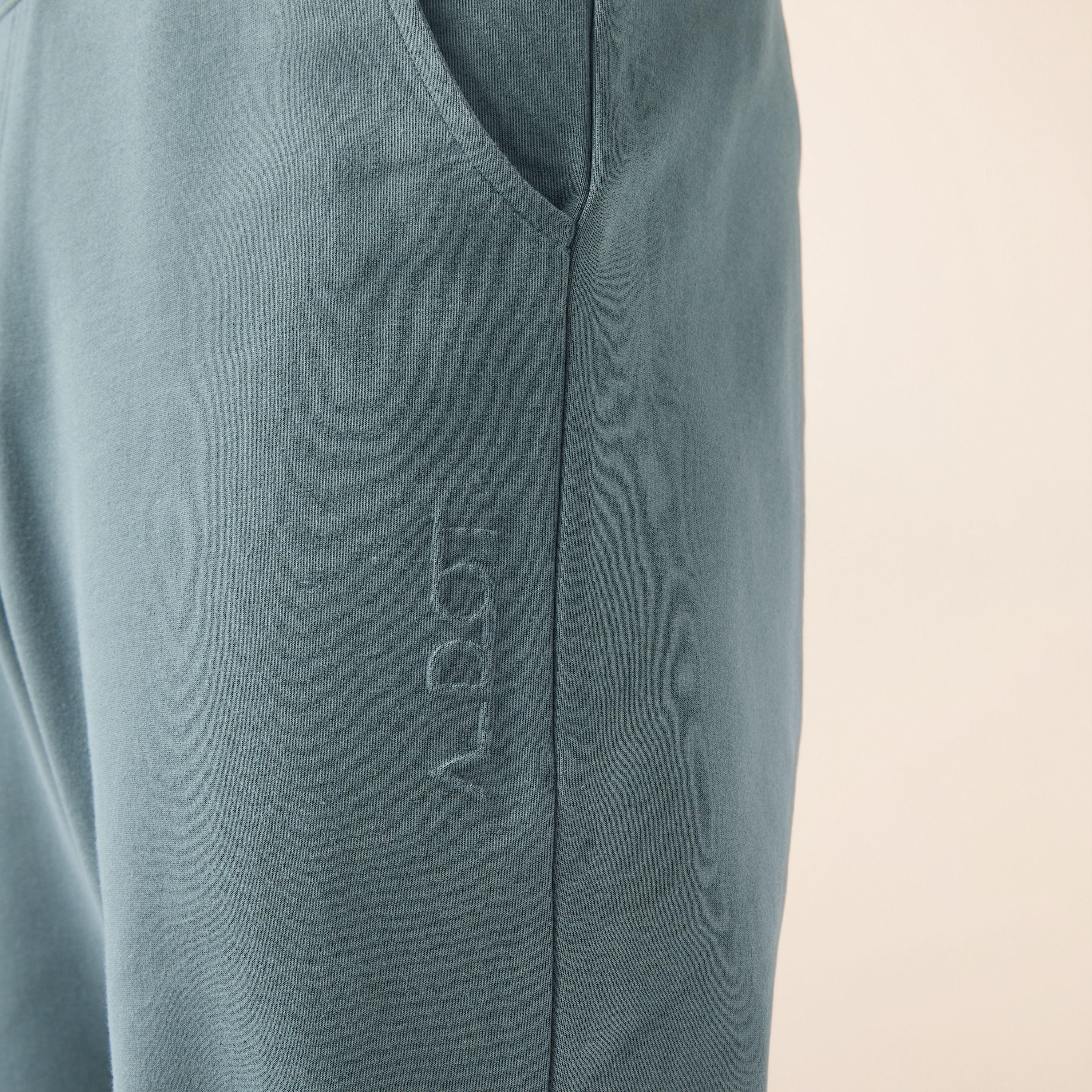 Embossed Logo Track Pants with Pockets-men-clothing-sportswearandactivewear-bottoms-joggers-image-4