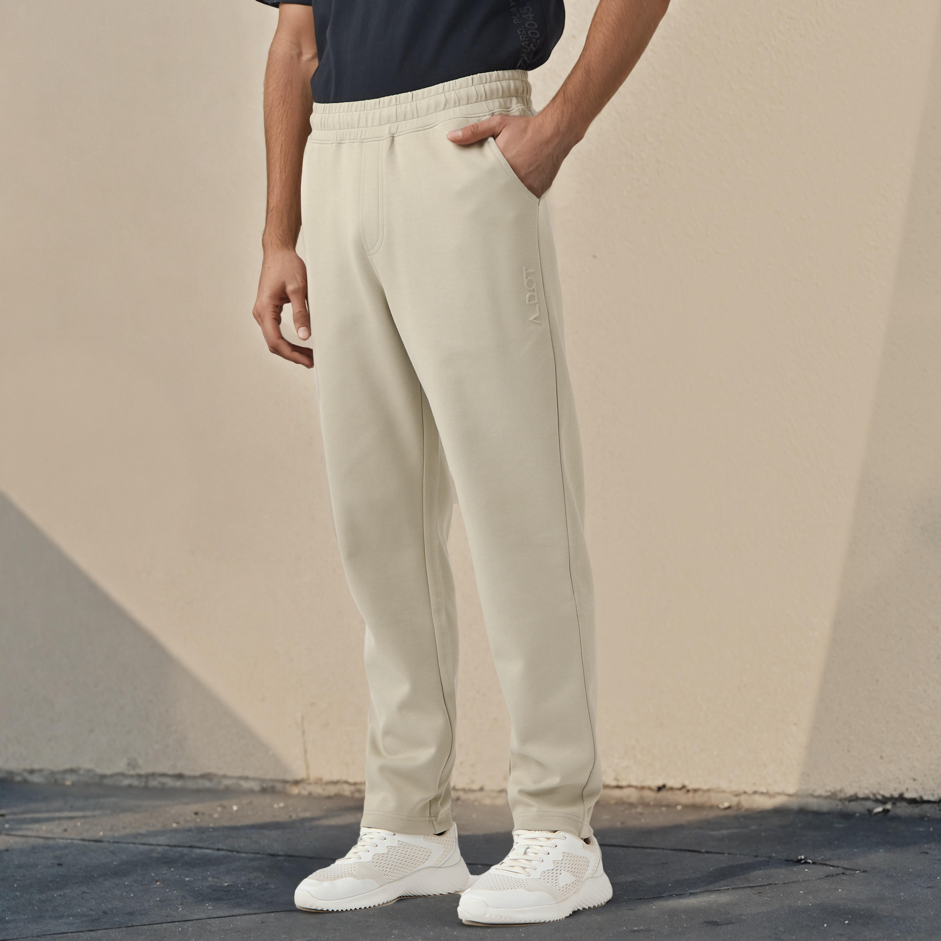 Embossed Logo Track Pants with Pockets-men-clothing-sportswearandactivewear-bottoms-joggers-image-1