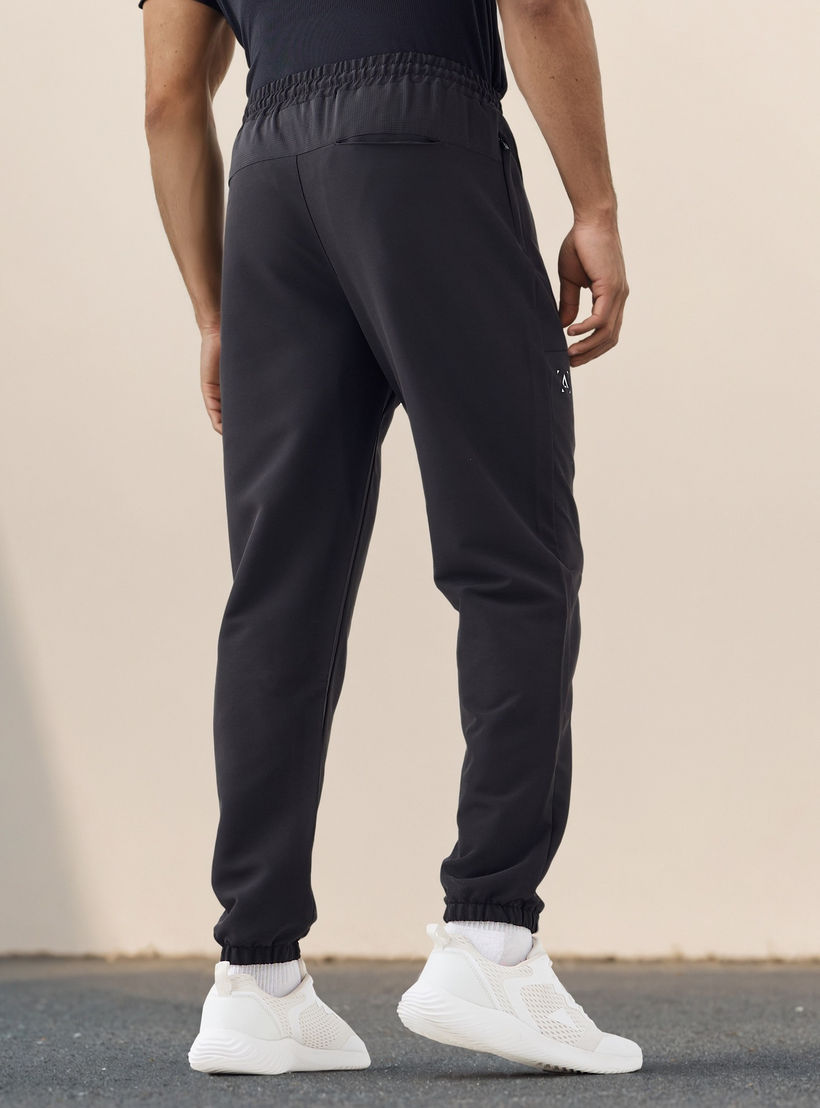 Joggers with Drawstring Closure and Pockets-men-clothing-sportswearandactivewear-tracksuits-image-3