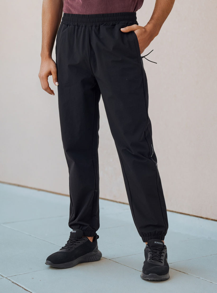 بنطلون رياضي بقصّة عادية وجيوب-men-clothing-sportswearandactivewear-bottoms-joggers-image-6