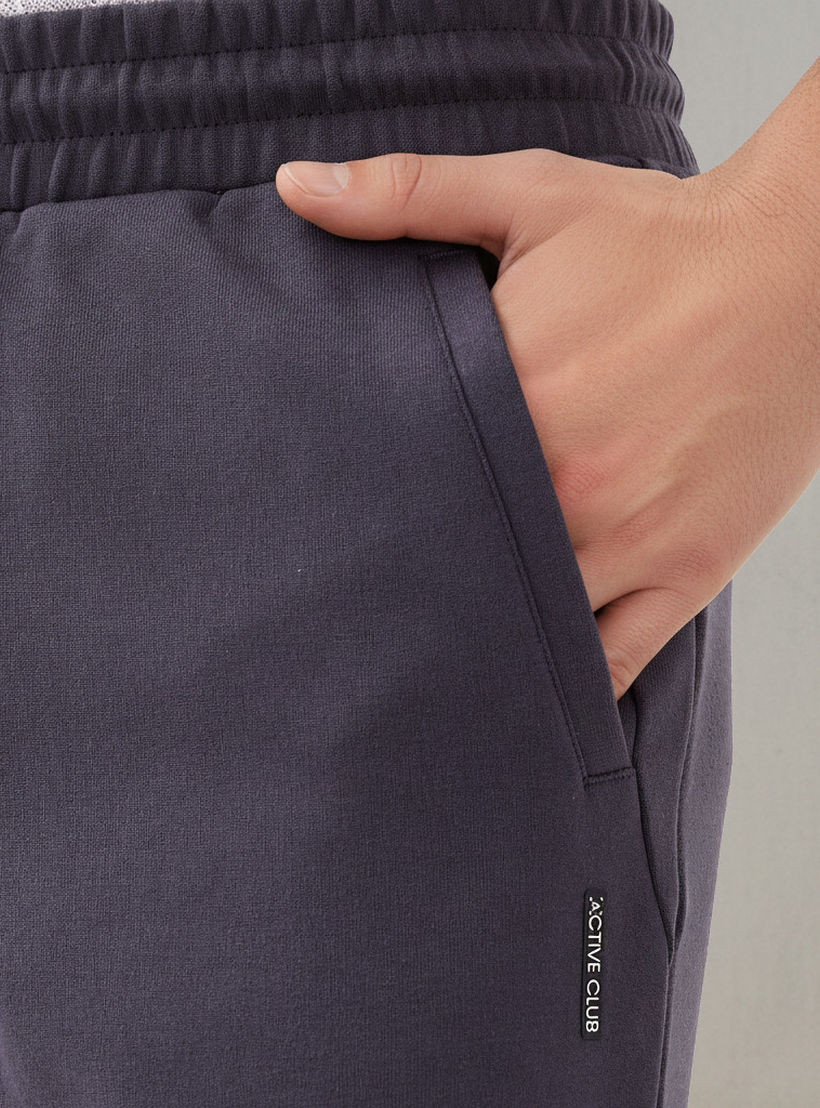بنطلون رياضي رجالي بقصة عادية ورباط خصر-men-clothing-sportswearandactivewear-bottoms-joggers-image-5