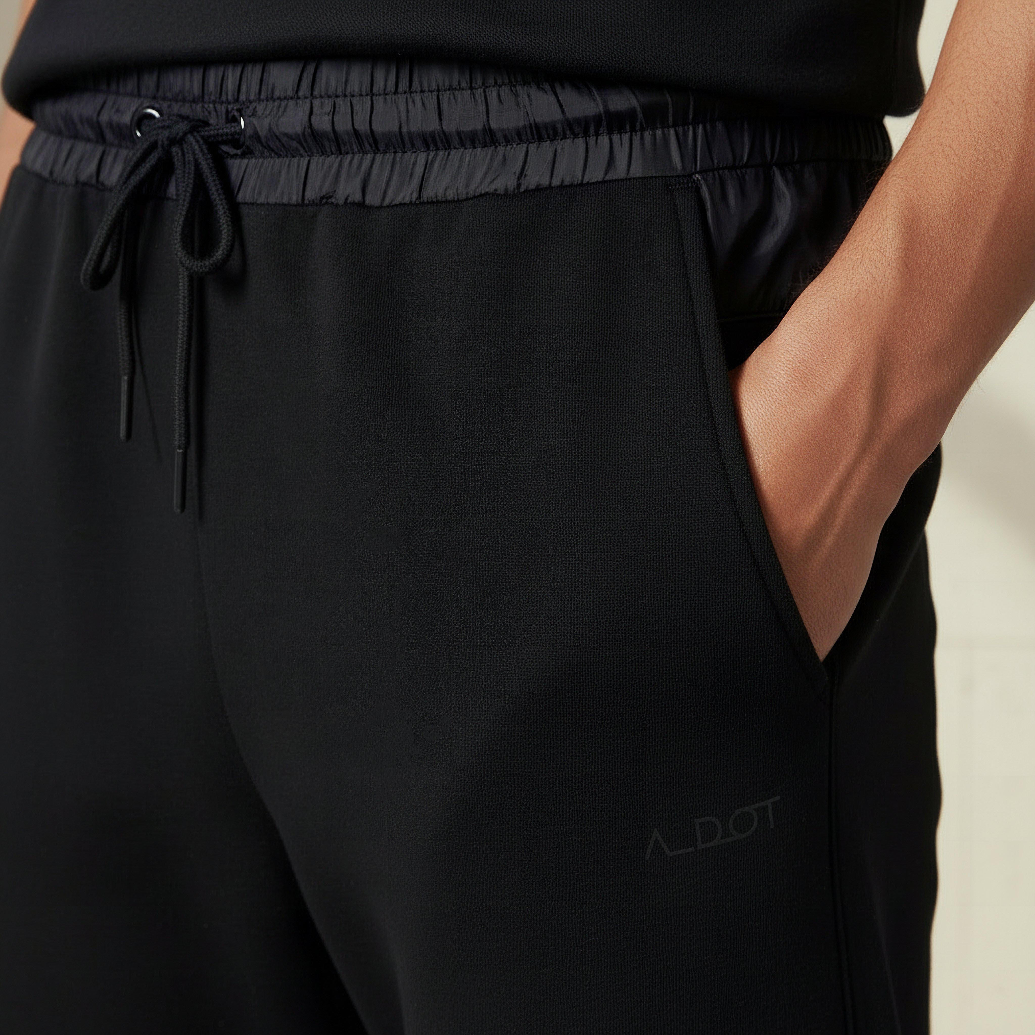 بنطلون رياضي رجالي بقصة عادية وجيوب-men-clothing-sportswearandactivewear-tracksuits-image-1