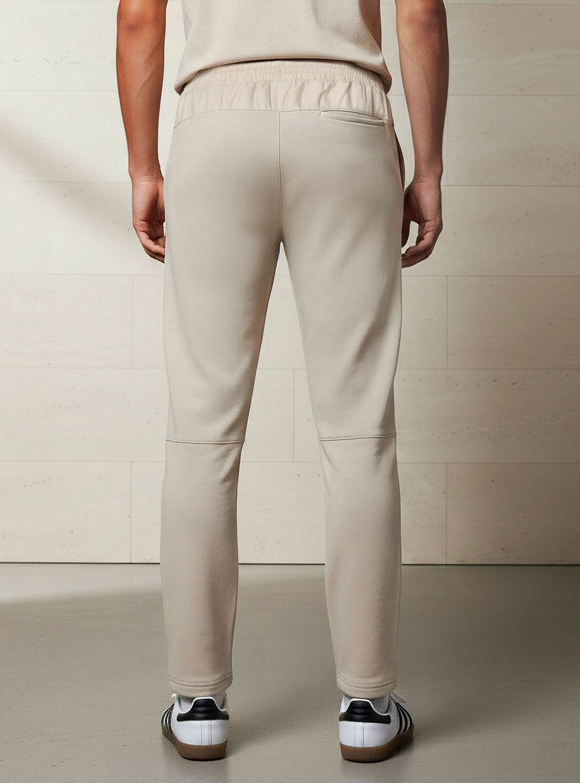 بنطلون رياضي رجالي بقصة عادية وجيوب-men-clothing-sportswearandactivewear-tracksuits-image-3