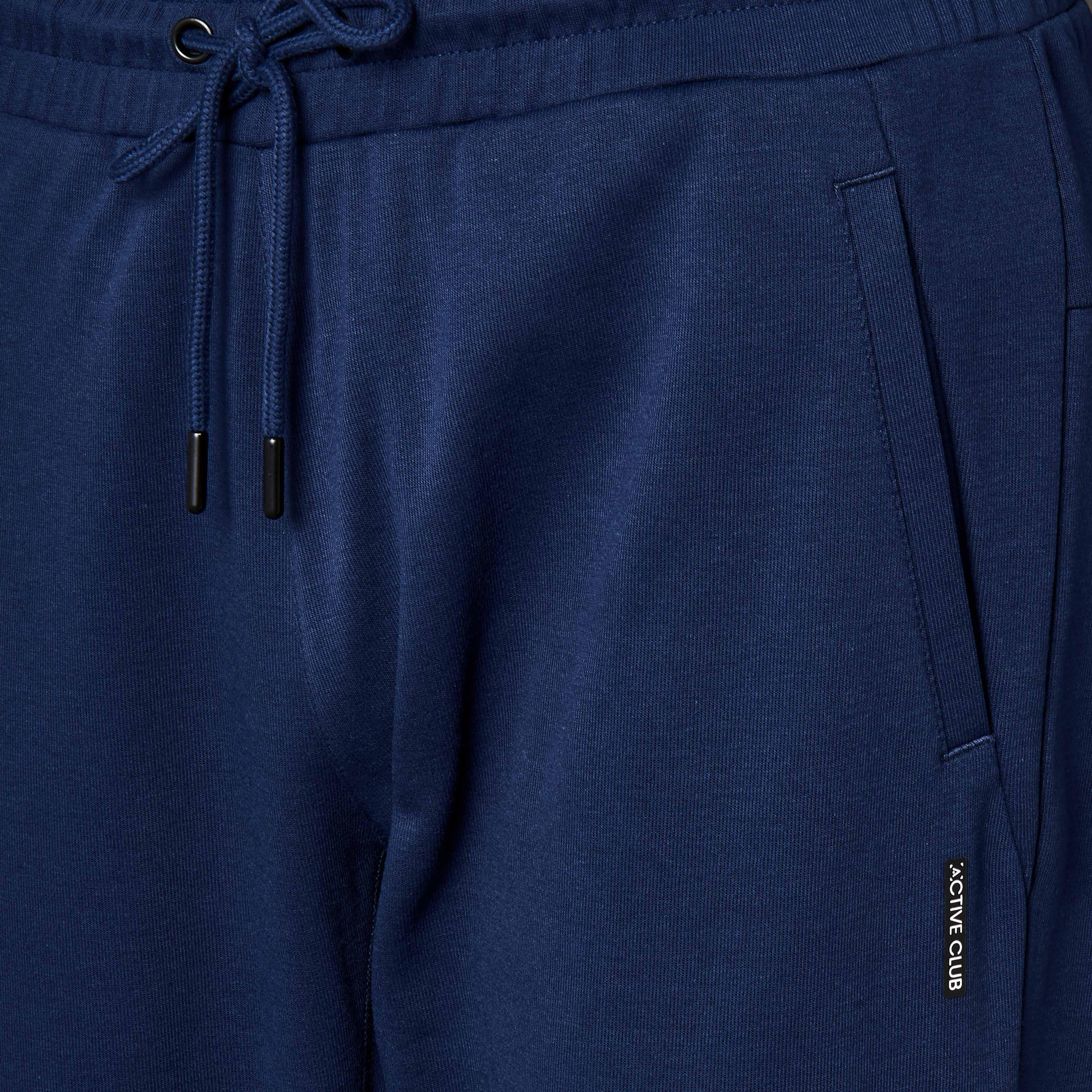 بنطلون رياضي بقصة عادية وجيوب للرجال-men-clothing-sportswearandactivewear-tracksuits-image-1