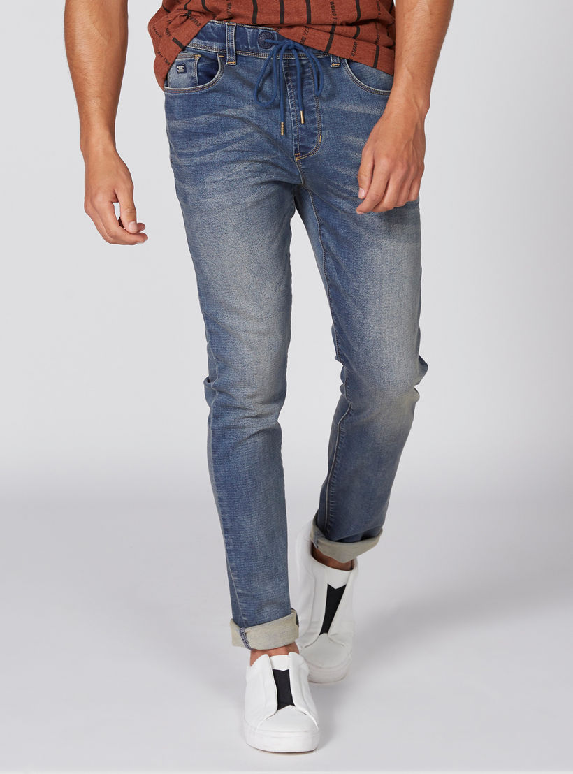 بِنطال جينز طويل برباط إغلاق وجيوب-men-clothing-bottoms-jeans-image-1