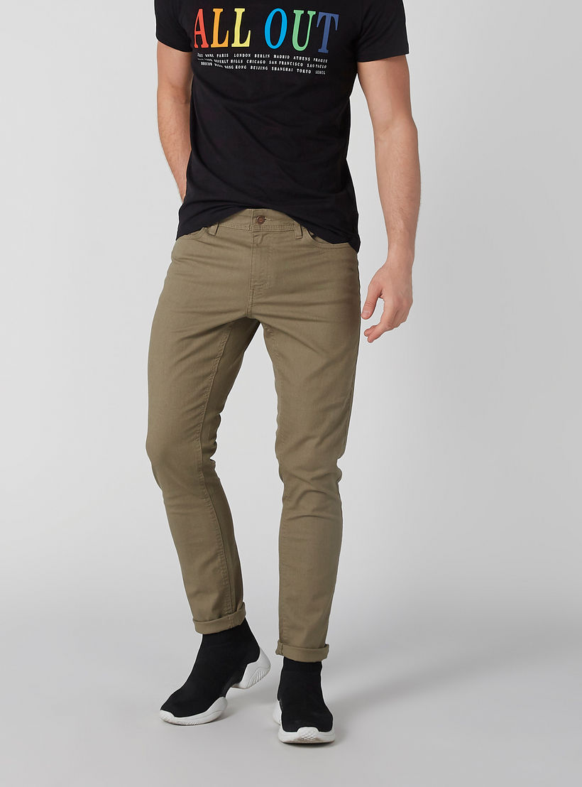 بنطال جينز سكيني بخصر منخفض وزر إغلاق وجيوب-men-clothing-bottoms-jeans-image-2