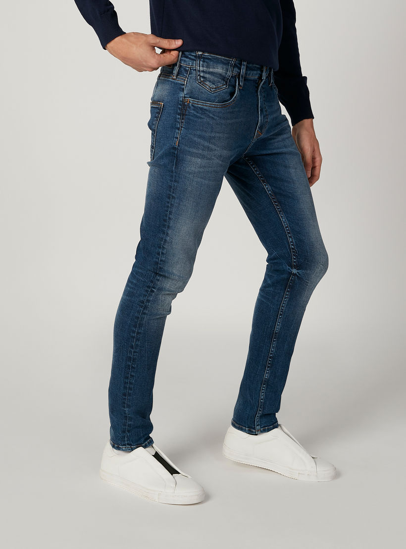 بنطلون جينز مستدام سليم سادة بخصر منخفض وجيوب -men-clothing-bottoms-jeans-image-5