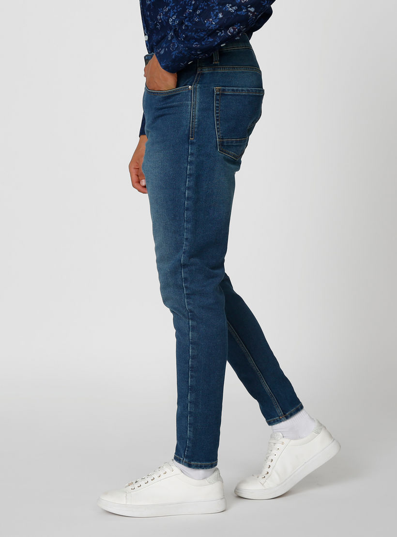 بنطلون جينز مستدام بقصّة جزرة وخصر متوسط الارتفاع وجيوب -men-clothing-bottoms-jeans-image-3