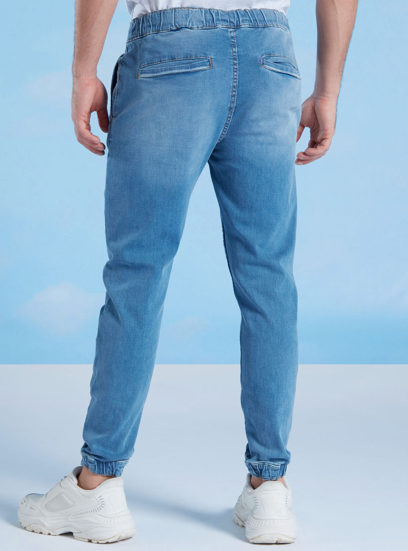 بنطلون رياضي دينم سادة سكيني وخصر مطاطي منخفض-men-clothing-bottoms-joggers-image-4
