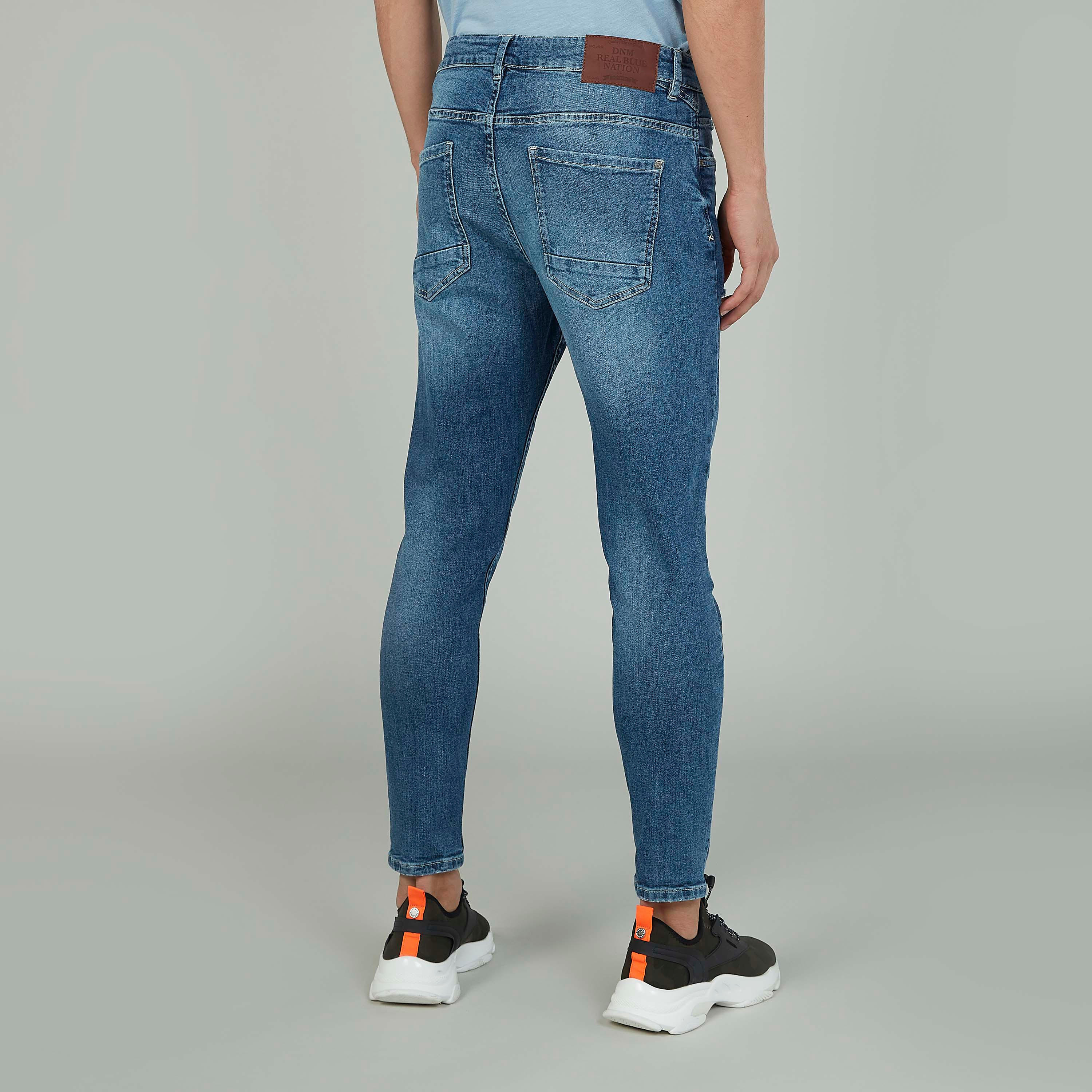 بنطلون جينز ممزّق بجيوب وحلقات حزام-men-clothing-bottoms-jeans-image-4