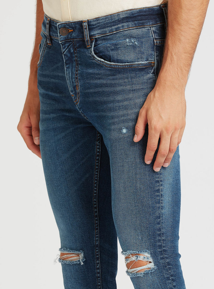 بنطلون جينز ممزّق بجيوب وعراوي-men-clothing-bottoms-jeans-image-3