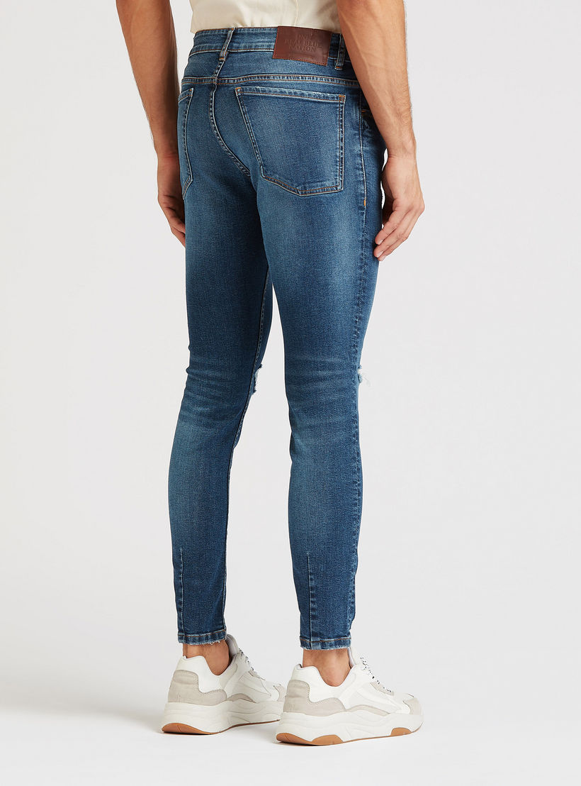 بنطلون جينز ممزّق بجيوب وعراوي-men-clothing-bottoms-jeans-image-4