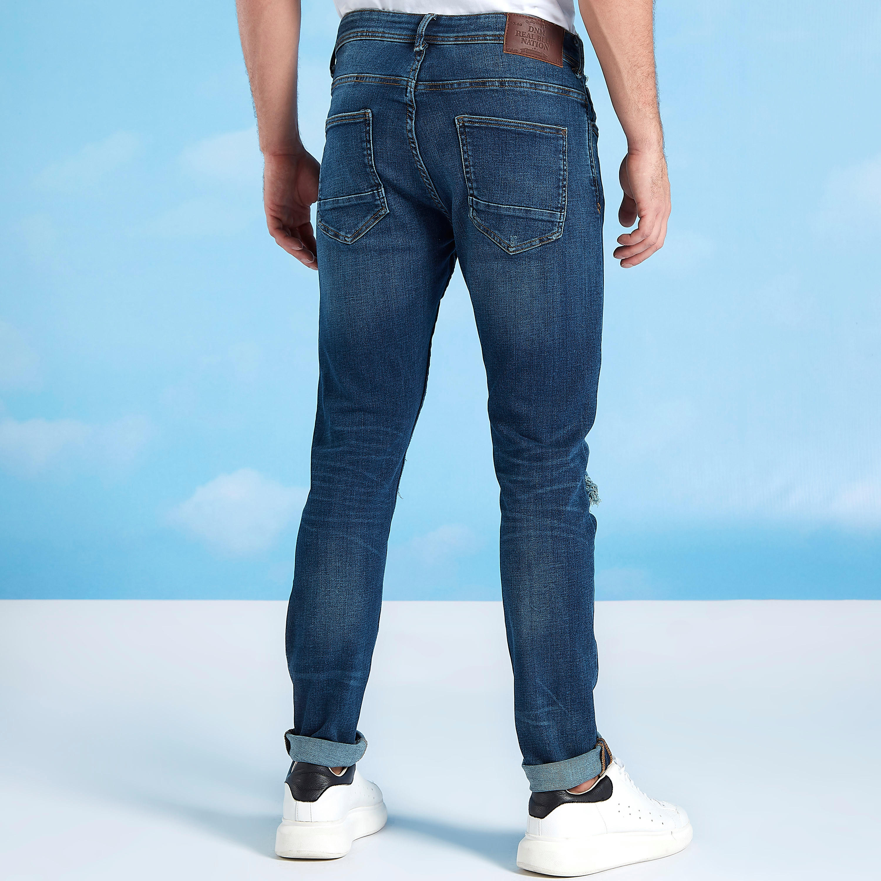 بنطلون جينز سليم ممزّق بخصر منخفض وجيوب-men-clothing-bottoms-jeans-image-4