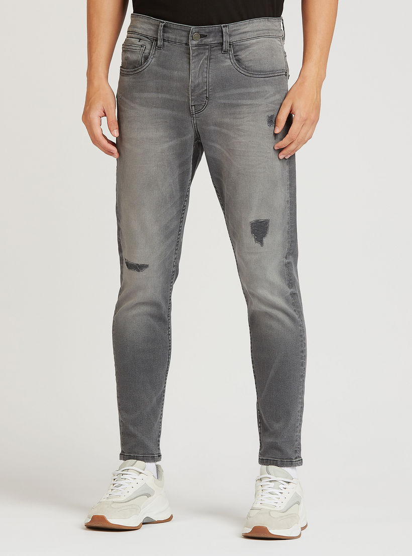 بنطلون جينز ممزّق بقصة سليم و خصر منخفض مع جيوب وحلقات للحزام-men-clothing-bottoms-jeans-image-1