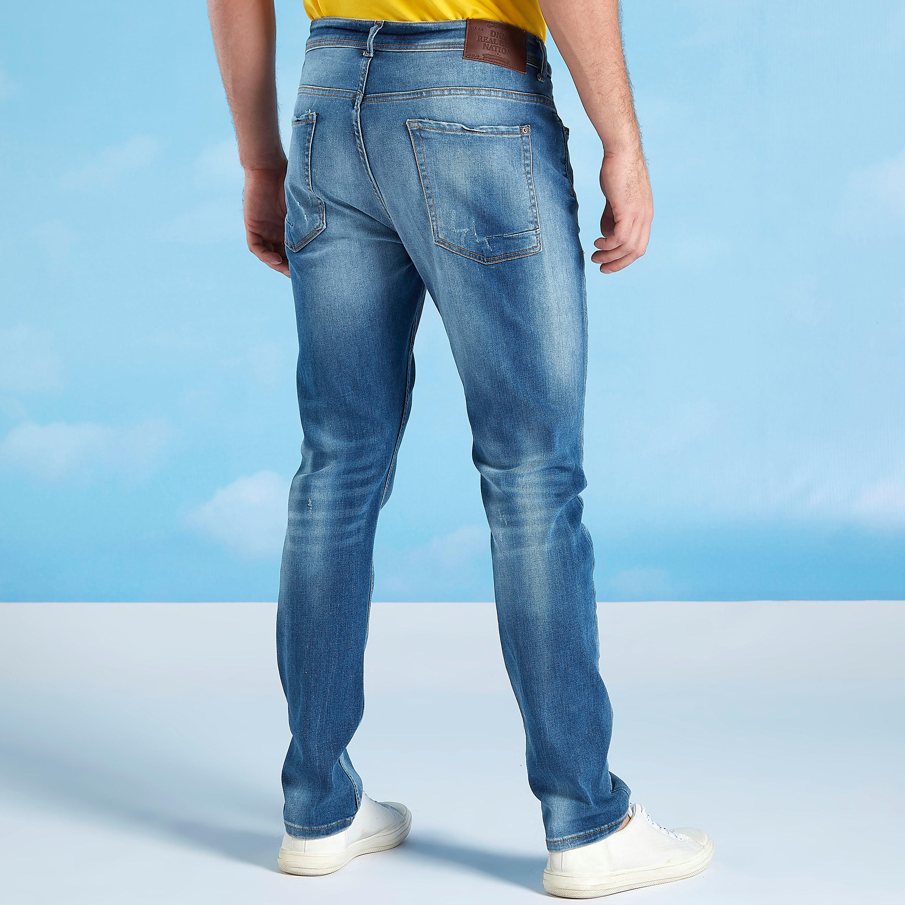 بنطلون جينز ممزّق بتفاصيل جيوب وعراوي-men-clothing-bottoms-jeans-image-4