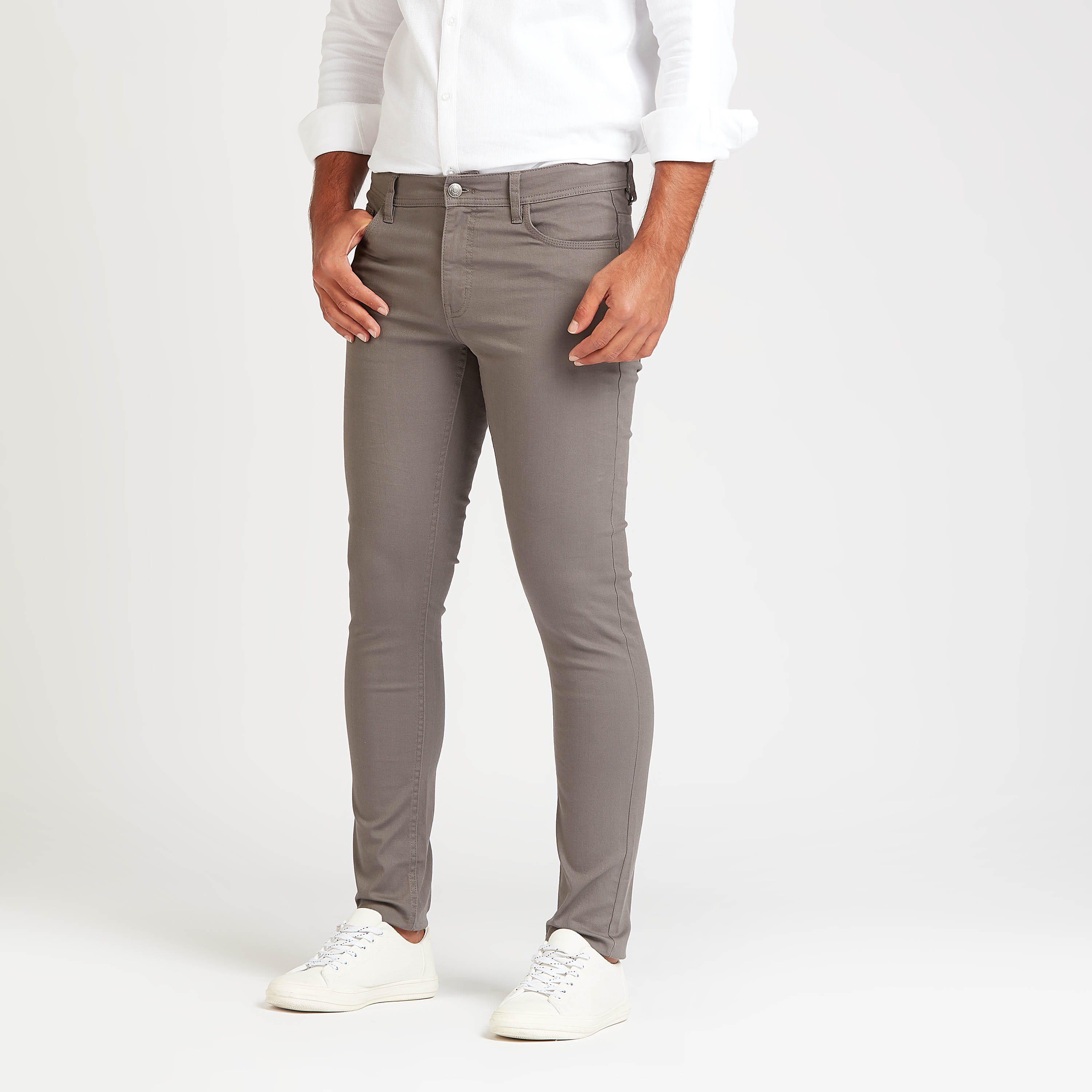 بنطلون جينز سكيني سادة بخصر منخفض وجيوب-men-clothing-bottoms-jeans-image-1