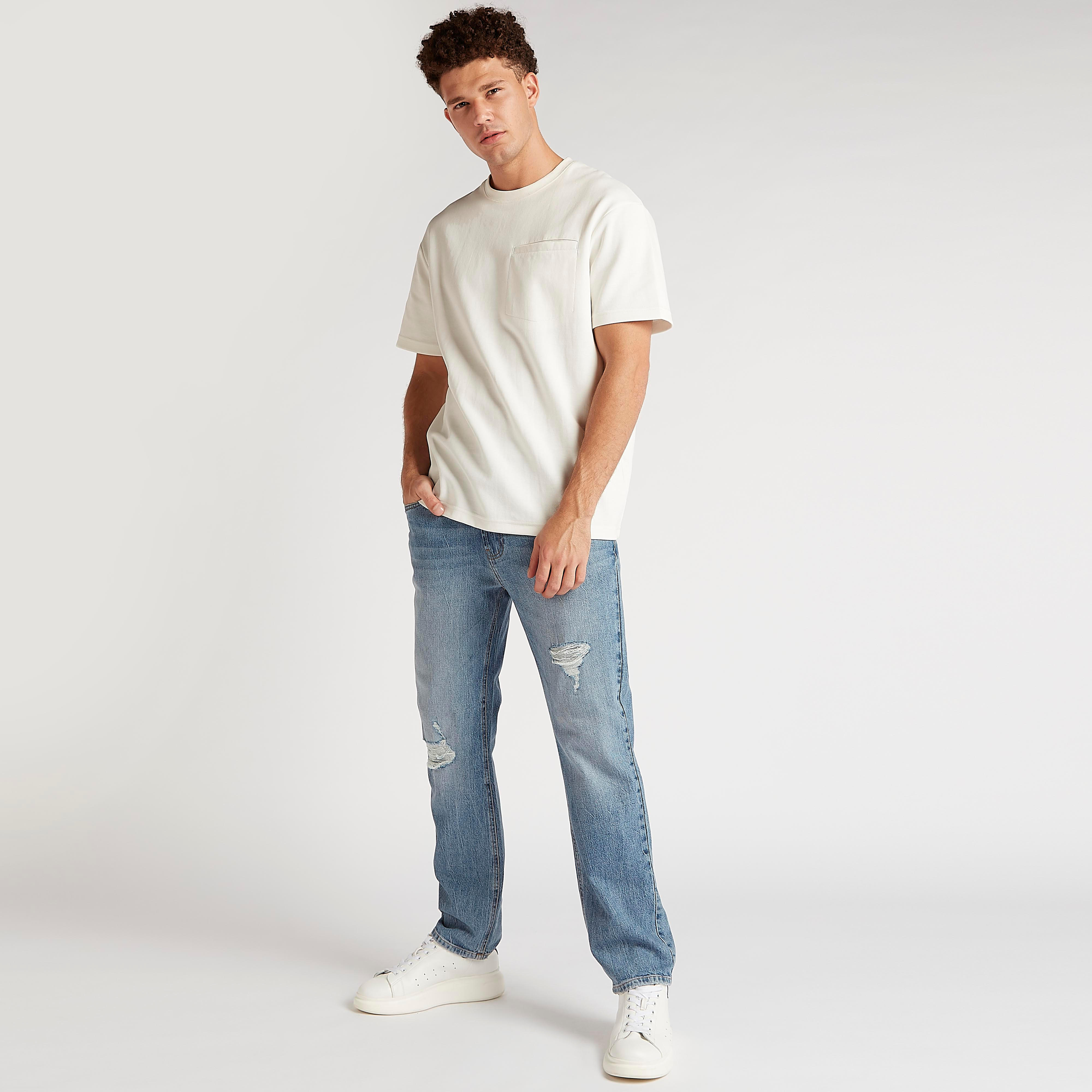 بنطلون جينز دنيم بقصّة مستقيمة وخصر متوسّط الارتفاع وزر إغلاق-men-clothing-bottoms-jeans-image-2