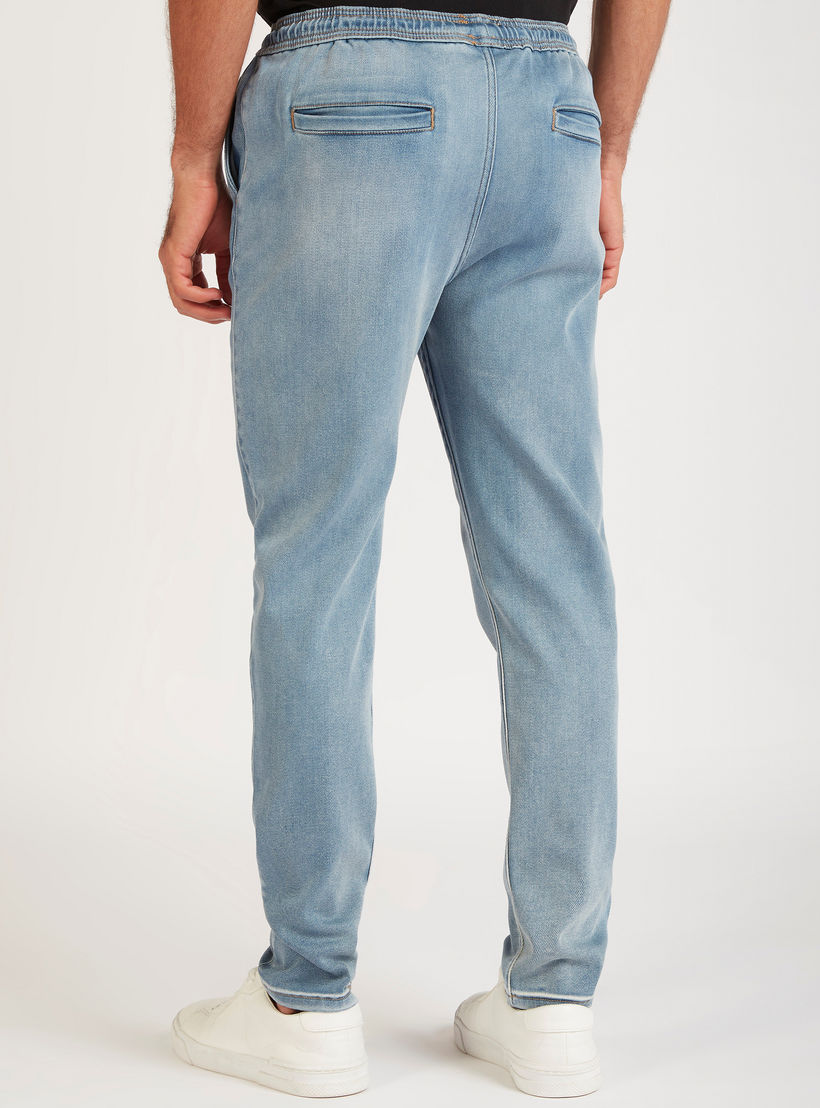 بنطلون جينز دنيم سادة برباط إغلاق وخصر متوسّط الارتفاع-men-clothing-bottoms-jeans-image-1