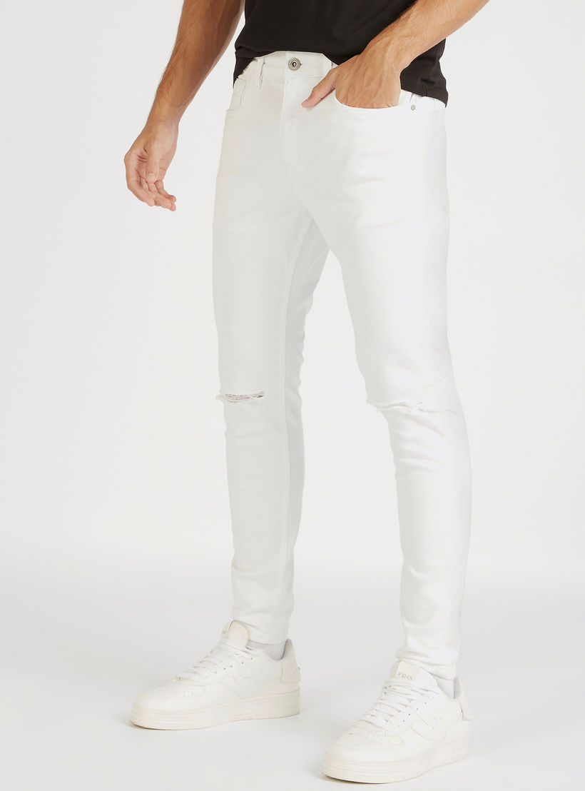 بنطلون جينز مضلّع بقصة سكيني وجيوب وخصر مرتفع-men-clothing-bottoms-jeans-image-1