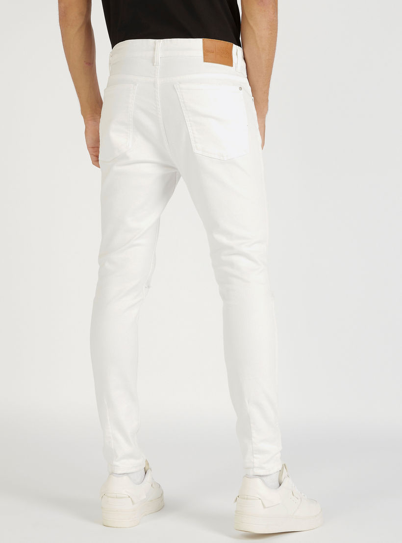 بنطلون جينز مضلّع بقصة سكيني وجيوب وخصر مرتفع-men-clothing-bottoms-jeans-image-4