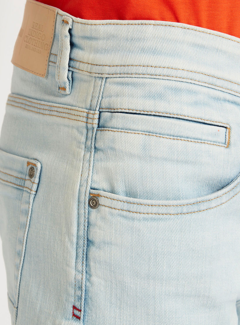 بنطلون جينز سادة بخصر مرتفع وجيوب-men-clothing-bottoms-jeans-image-1