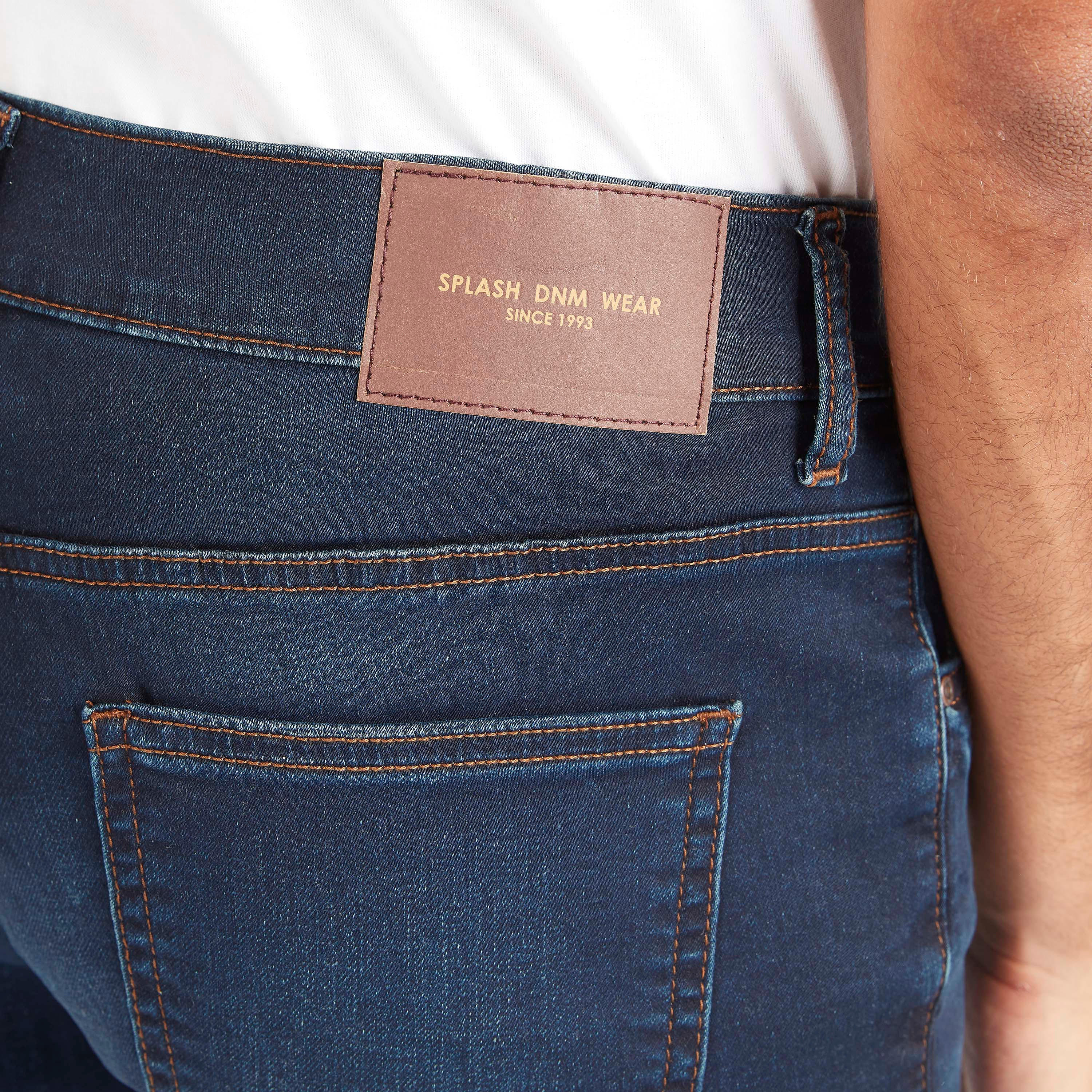 بنطلون جينز بقصّة سليم وخصر متوسط الارتفاع وجيوب-men-clothing-bottoms-jeans-image-1