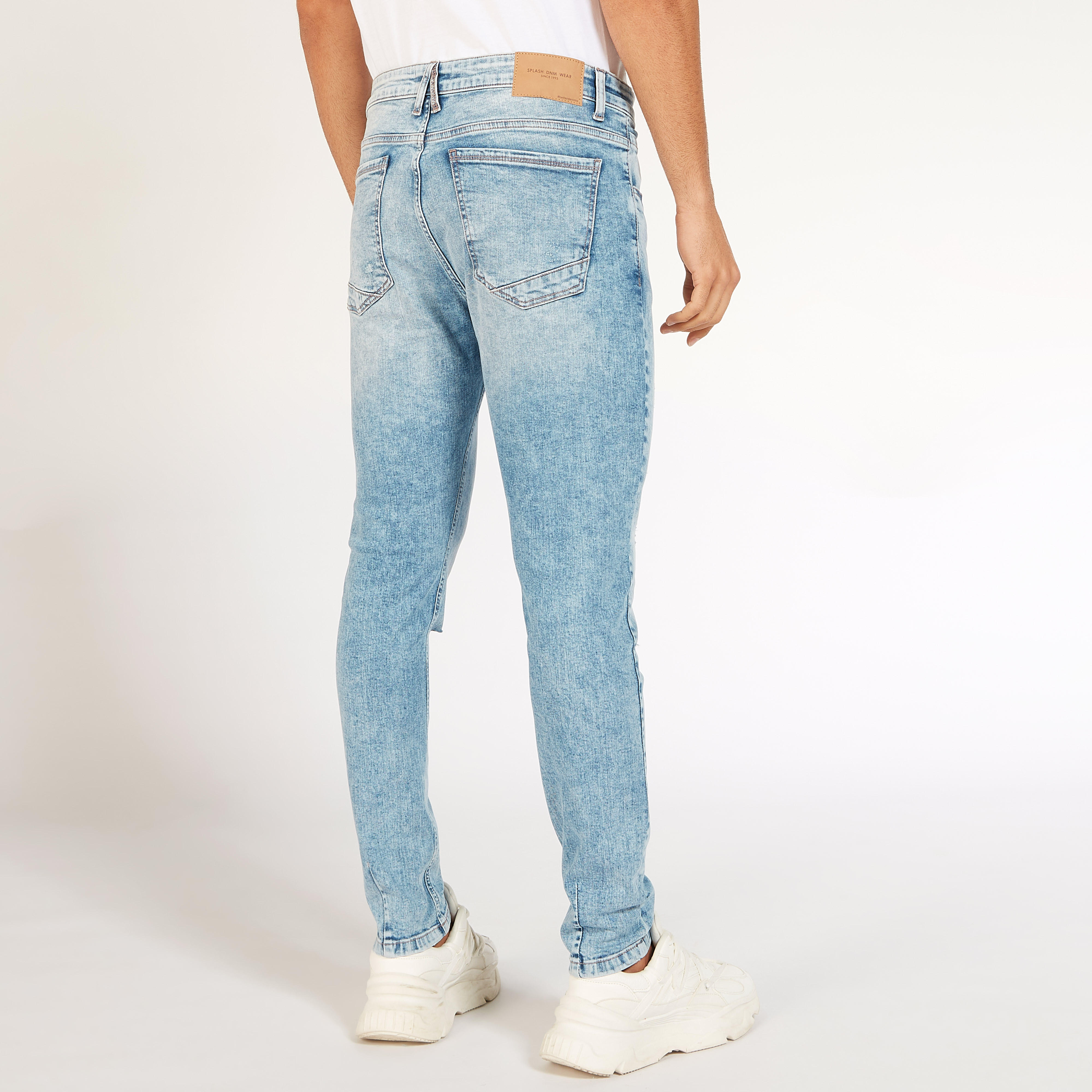 Ripped Denim Jeans with Button Closure and Pockets-men-clothing-bottoms-joggers-image-4