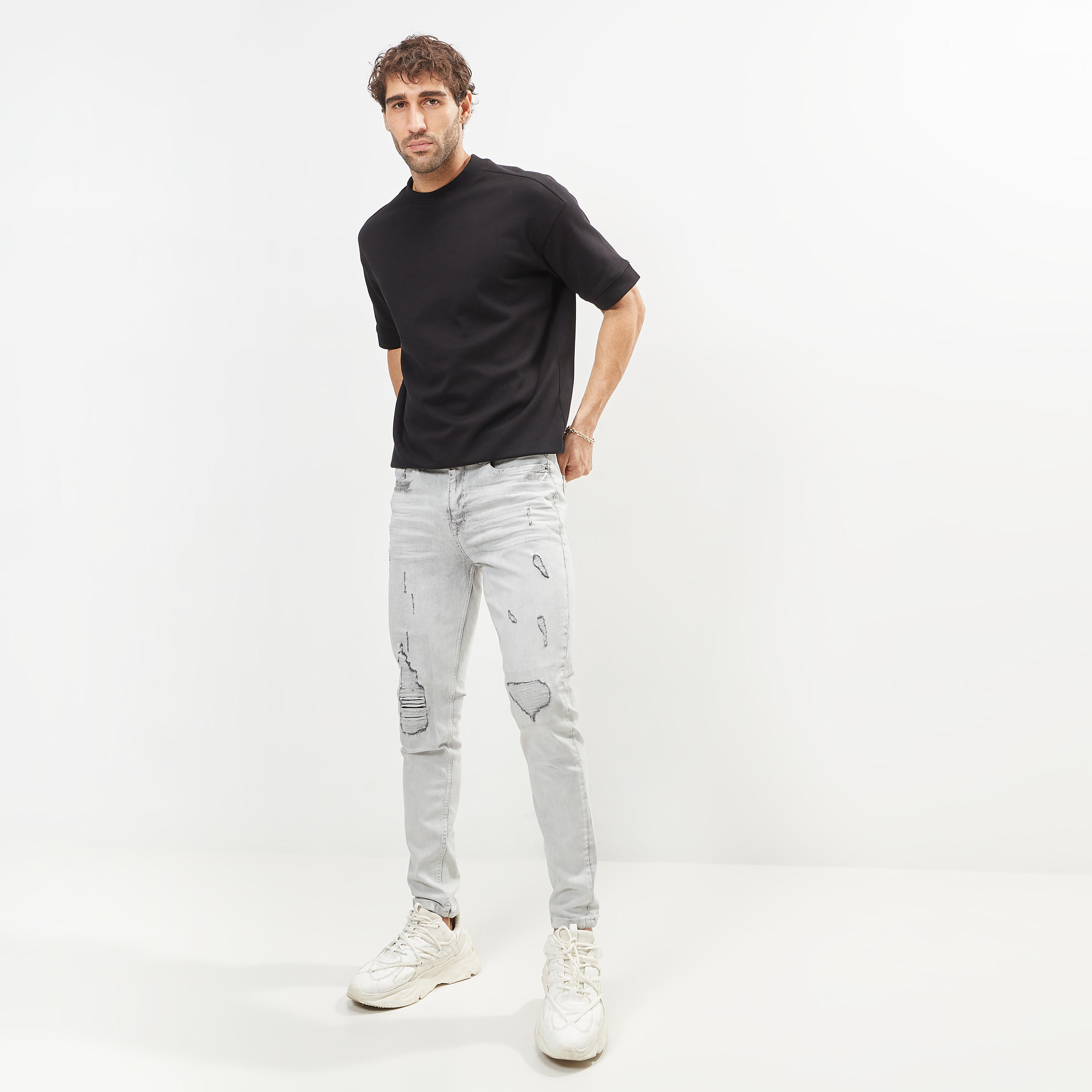 Ripped Carrot Fit Denim Jeans with Button Closure-men-clothing-bottoms-jeans-image-24