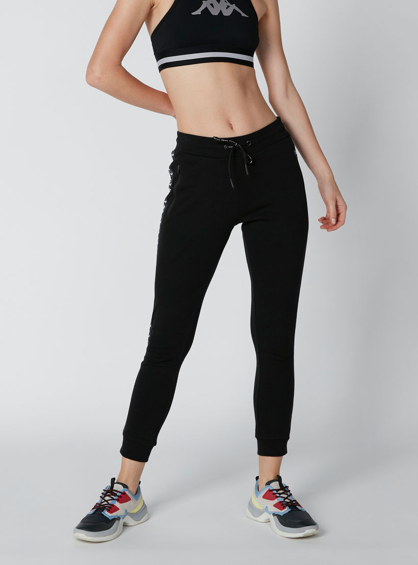 بنطال رياضي بسحّاب وشريطة بطبعات من كابا-women-clothing-sportswearandactivewear-bottoms-image-1