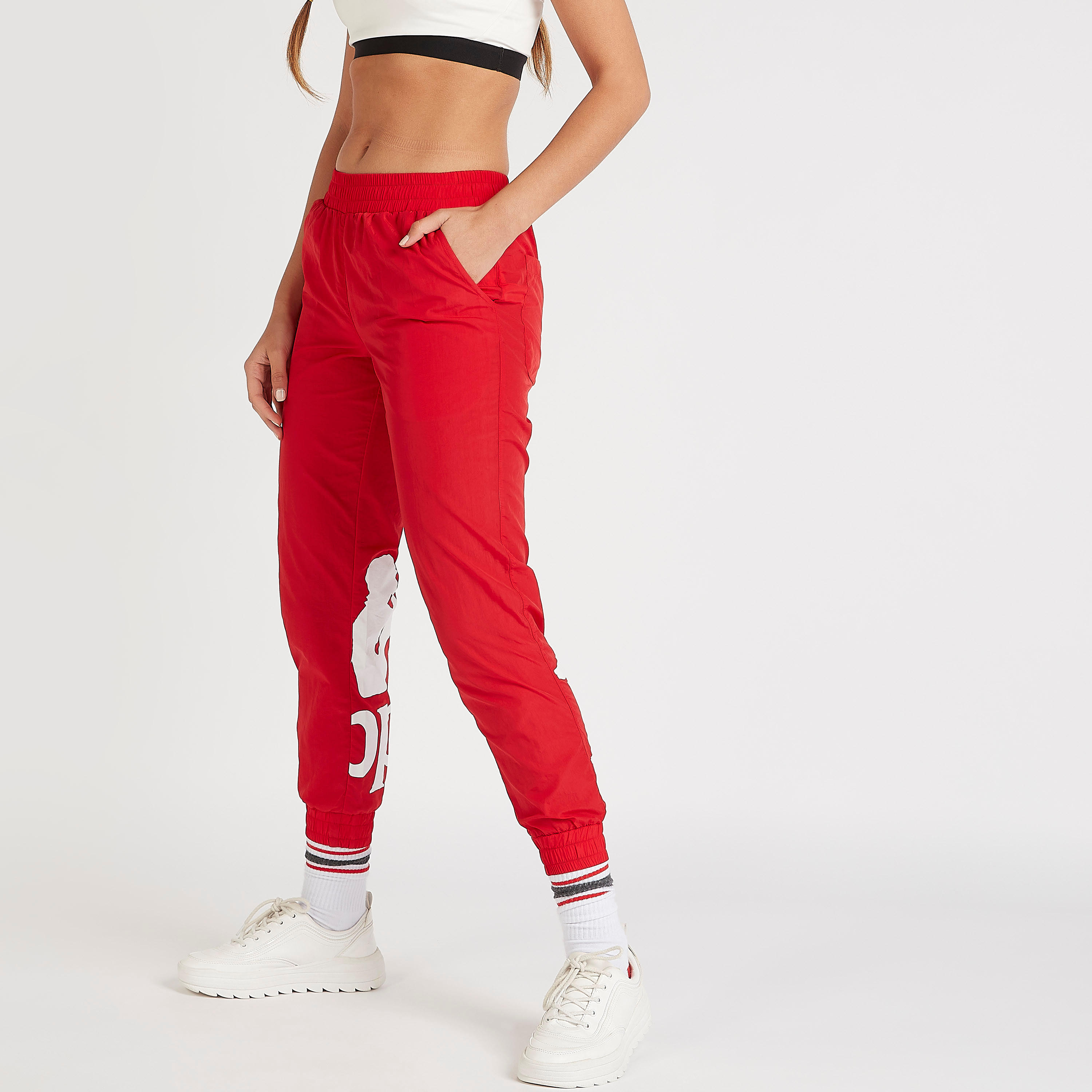 بنطلون رياضي بطبعات وجيوب وخصر مطّاطي من كابا-women-clothing-bottoms-joggers-image-1