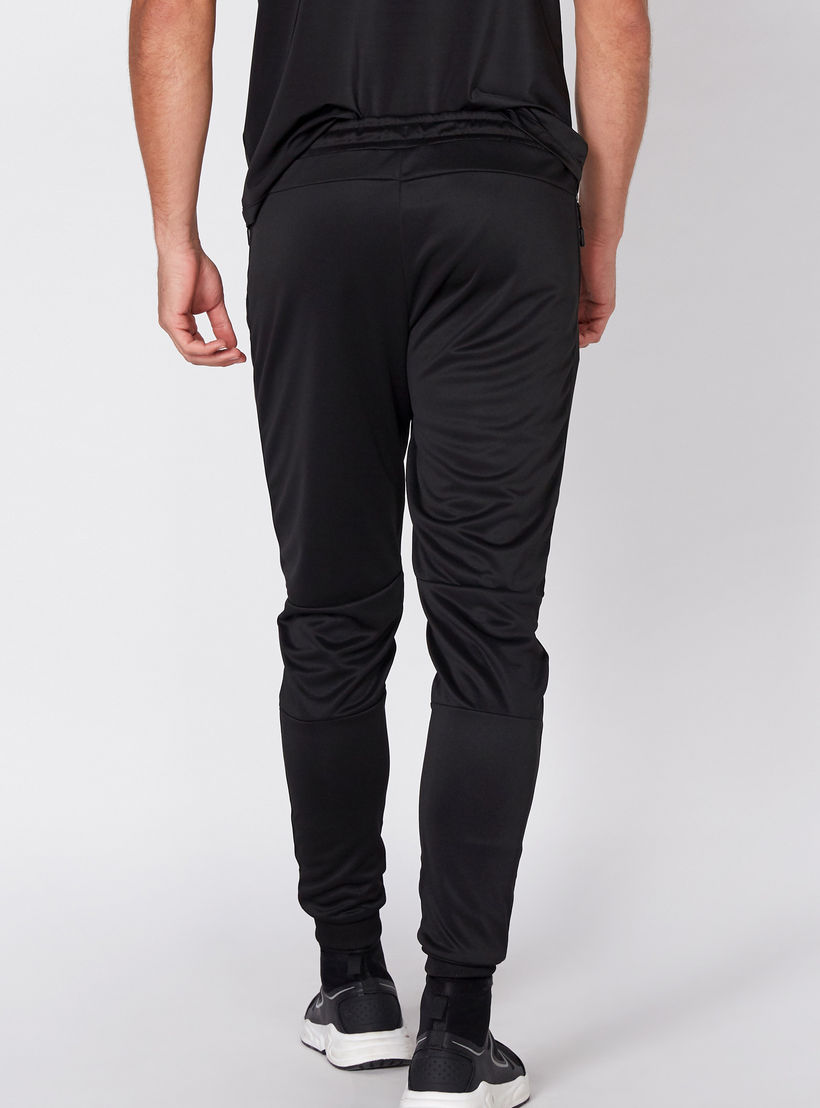 بنطال رياضي طويل بخصر مطاطي وطبعات من كابا-men-clothing-sportswearandactivewear-bottoms-image-4