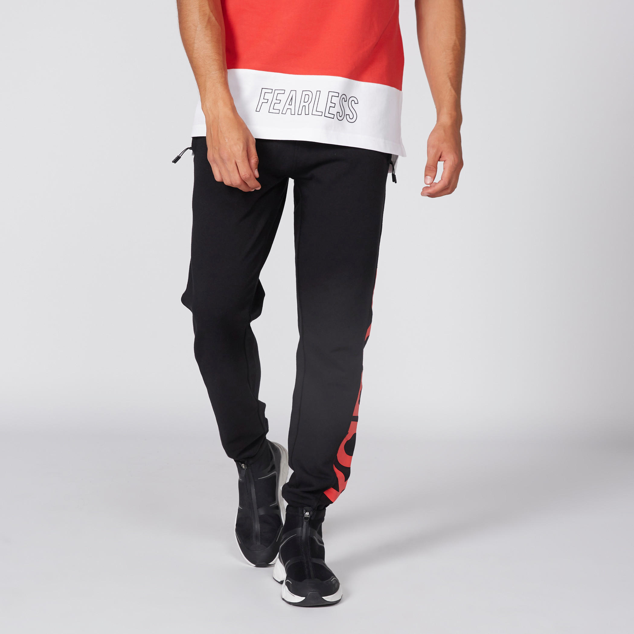 بنطال رياضي طويل بجيوب وطبعات من كابا-men-clothing-sportswearandactivewear-bottoms-image-1