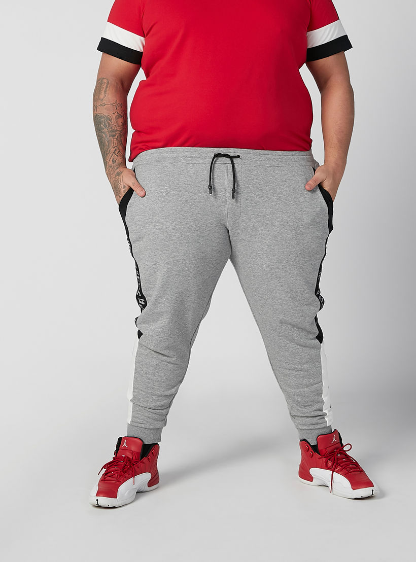 بنطلون رياضي مستدام برباط وطبعات من كابا -men-clothing-bottoms-joggers-image-3