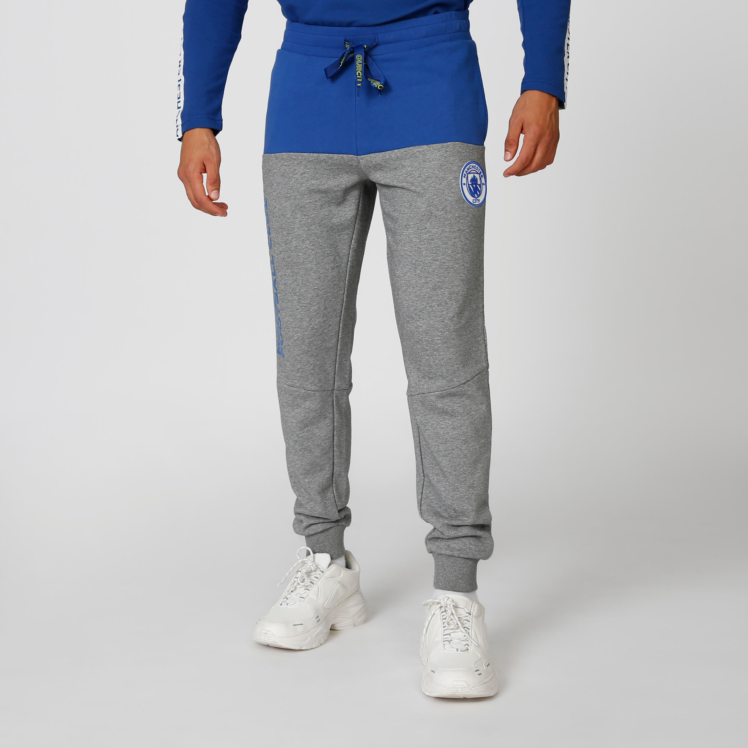 بنطلون رياضي بخصر مطّاطي وطبعات مانشستر سيتي-men-clothing-sportswearandactivewear-bottoms-image-1