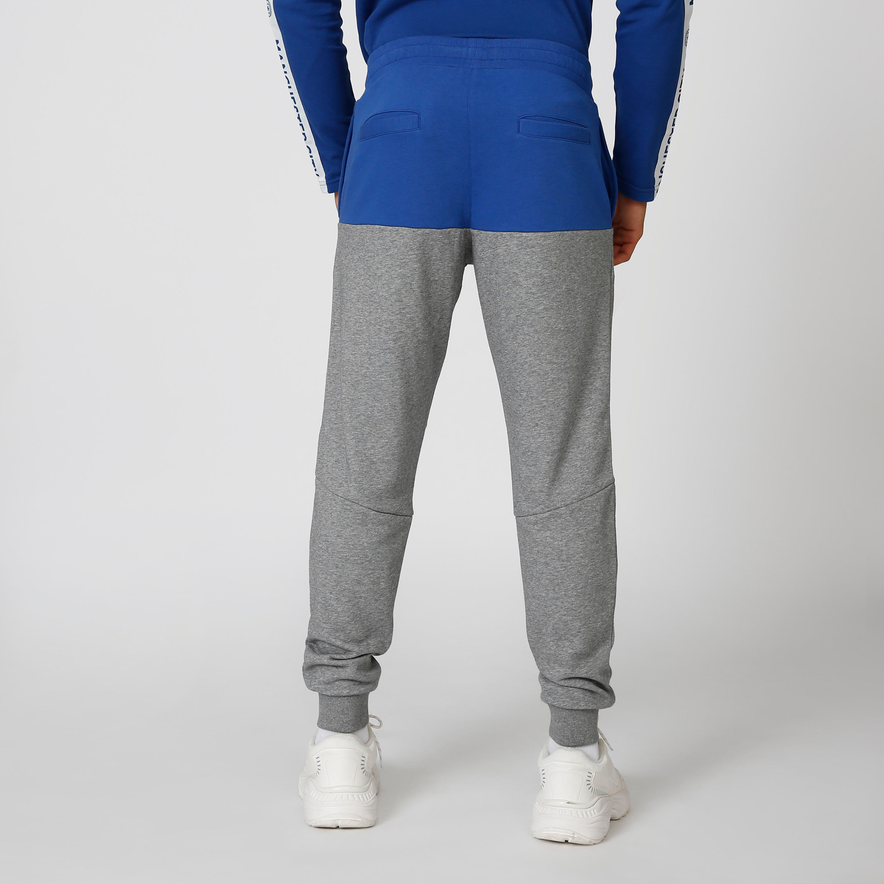 بنطلون رياضي بخصر مطّاطي وطبعات مانشستر سيتي-men-clothing-sportswearandactivewear-bottoms-image-5