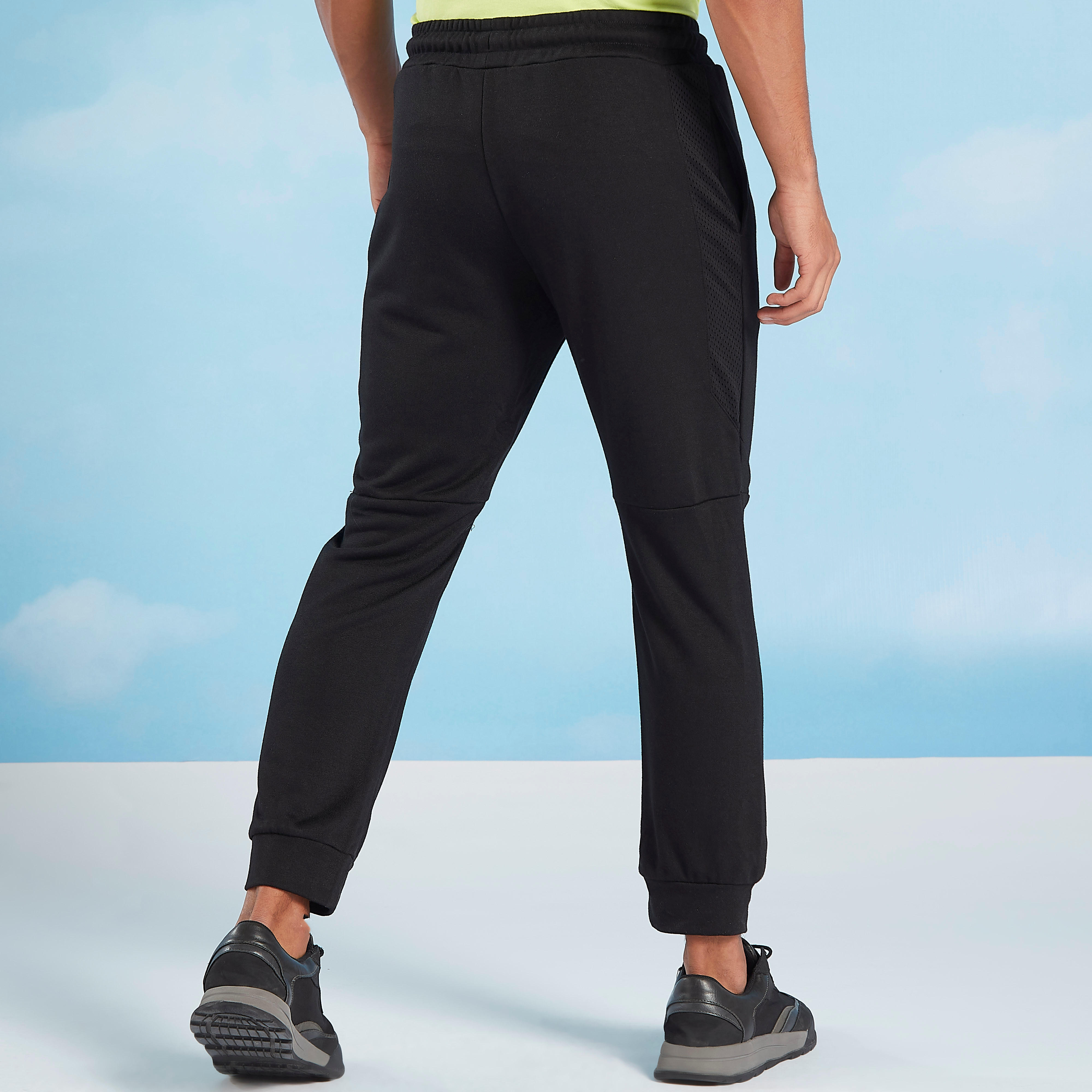 بنطلون رياضي سادة بجيوب وطبعات من كابا-men-clothing-sportswearandactivewear-bottoms-image-1