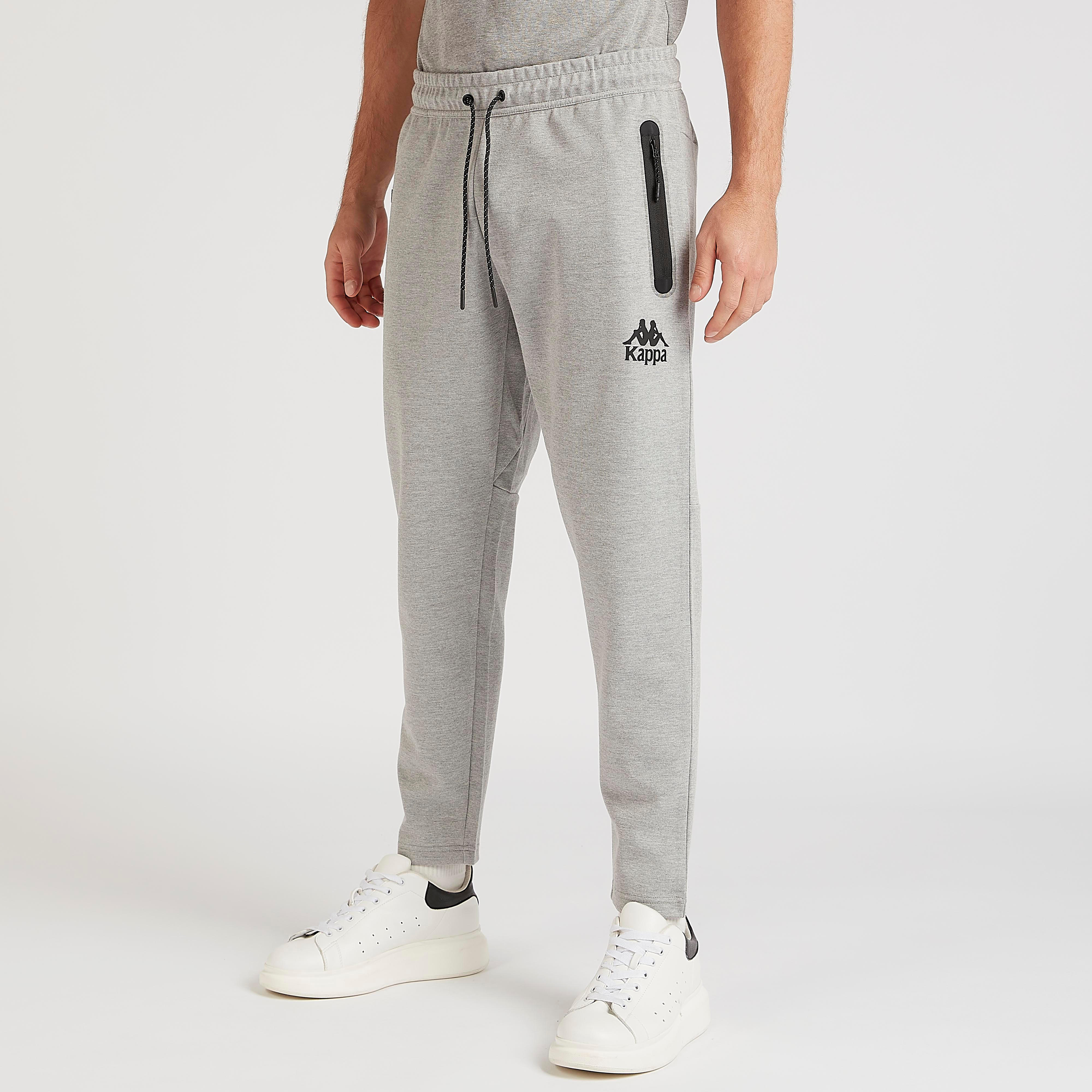 بنطلون رياضي سادة بخصر مطّاطي وجيوب من كابا-men-clothing-sportswearandactivewear-tracksuits-image-4