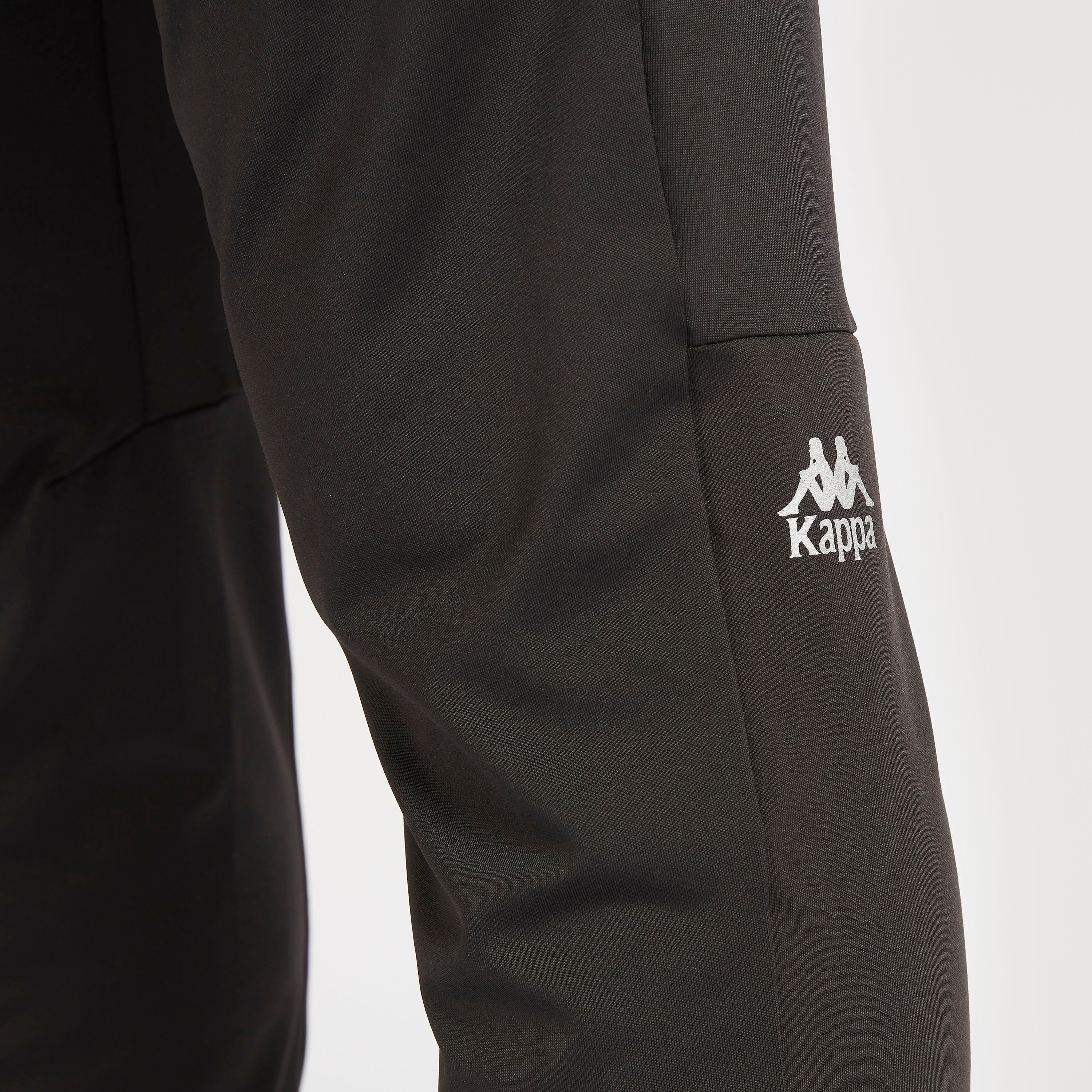 بنطلون رياضي سادة بخصر مطّاطي وجيوب-men-clothing-sportswearandactivewear-tracksuits-image-3