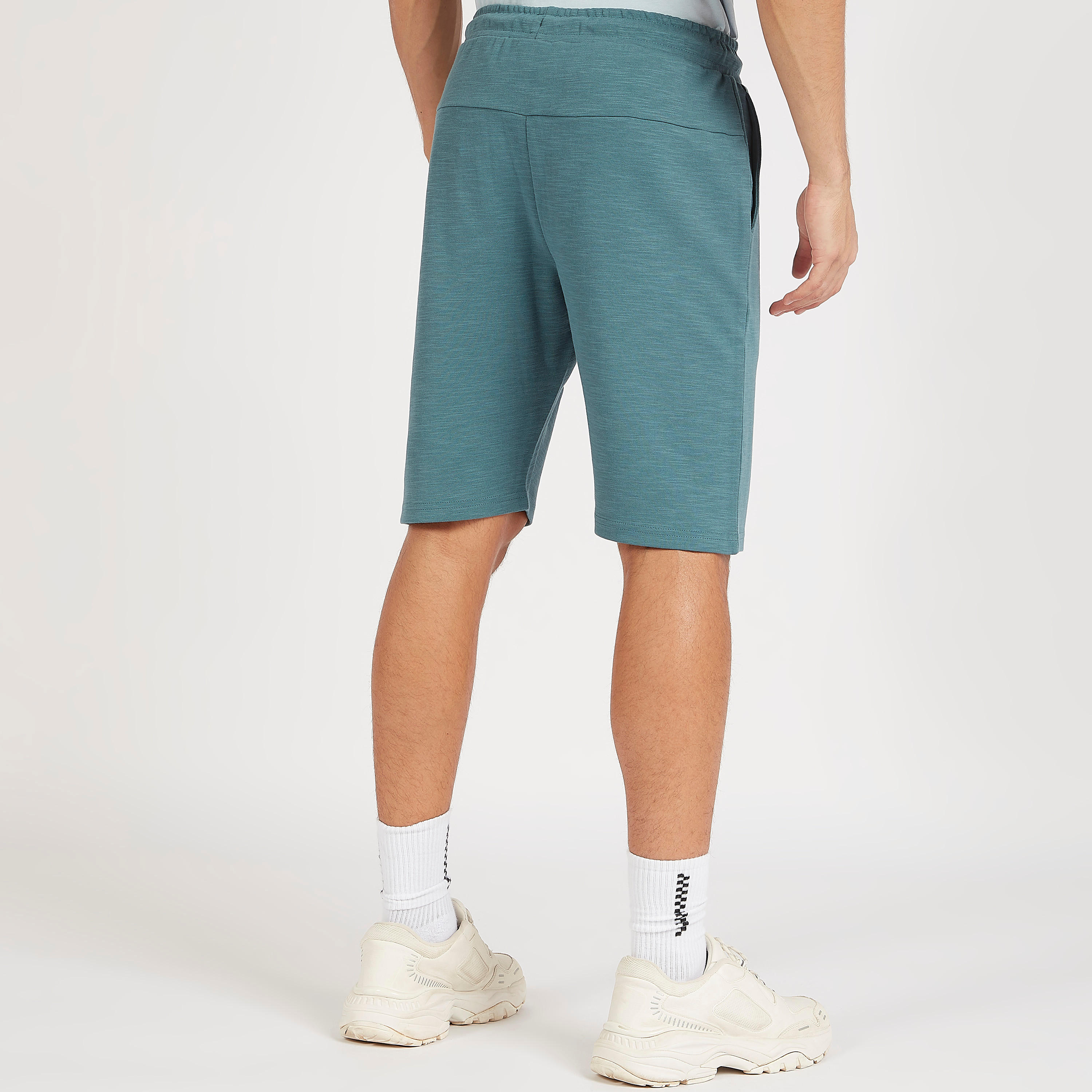 شورت مطرّز ورباط إغلاق من كابا-men-clothing-sportswearandactivewear-bottoms-image-1