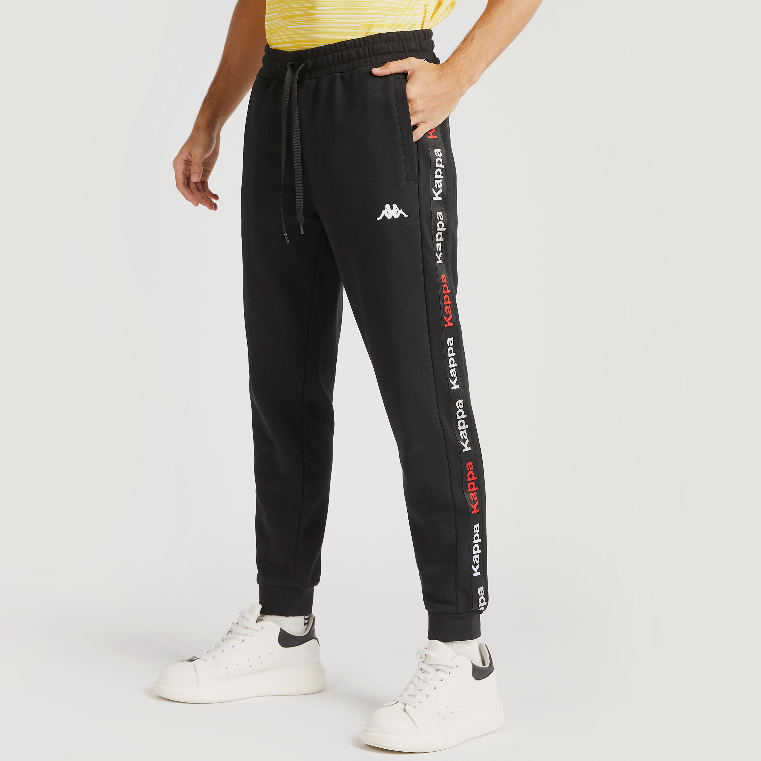 بنطلون رياضي سادة بتفاصيل شريطة ورباط إغلاق من كابا-men-clothing-sportswearandactivewear-tracksuits-image-1