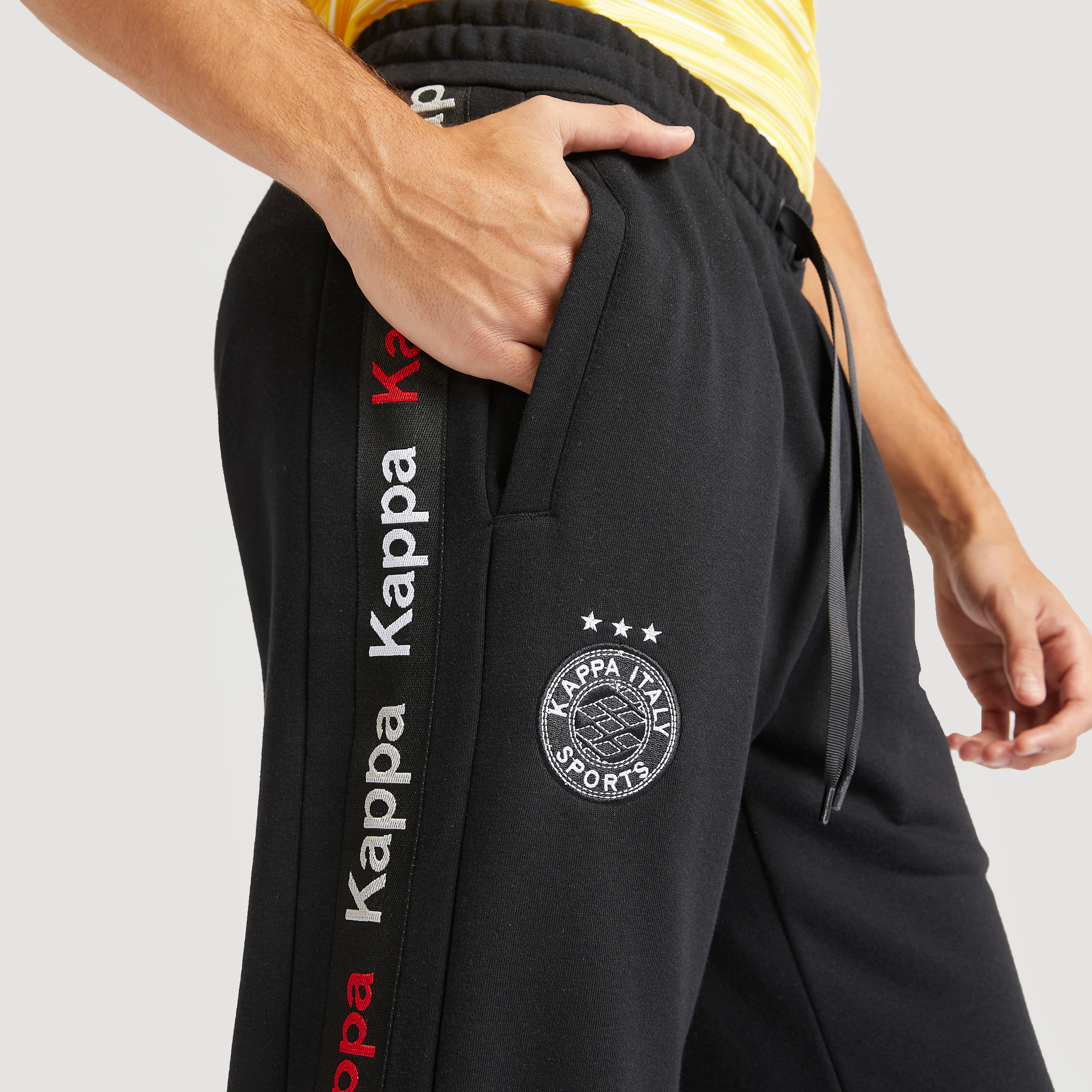 بنطلون رياضي سادة بتفاصيل شريطة ورباط إغلاق من كابا-men-clothing-sportswearandactivewear-tracksuits-image-3
