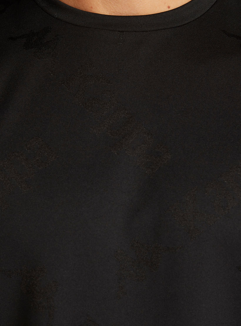 تيشيرت دون أكمام بياقة ضيّقة وطبعات من كابا-men-clothing-sportswearandactivewear-tshirtsandpolos-image-4