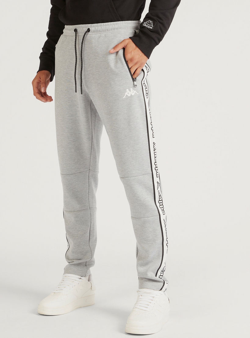 بنطلون رياضي بتفاصيل شريطة وطبعات شعار من كابا-men-clothing-sportswearandactivewear-tracksuits-image-1