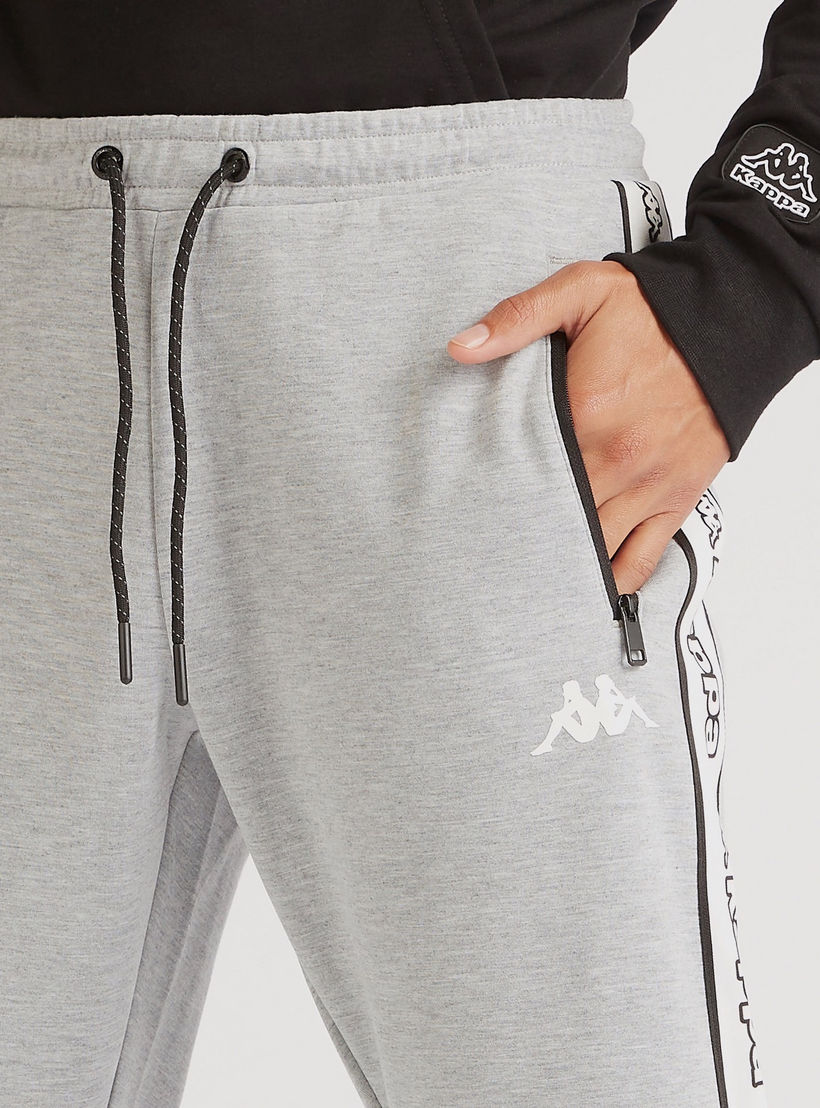بنطلون رياضي بتفاصيل شريطة وطبعات شعار من كابا-men-clothing-sportswearandactivewear-tracksuits-image-3
