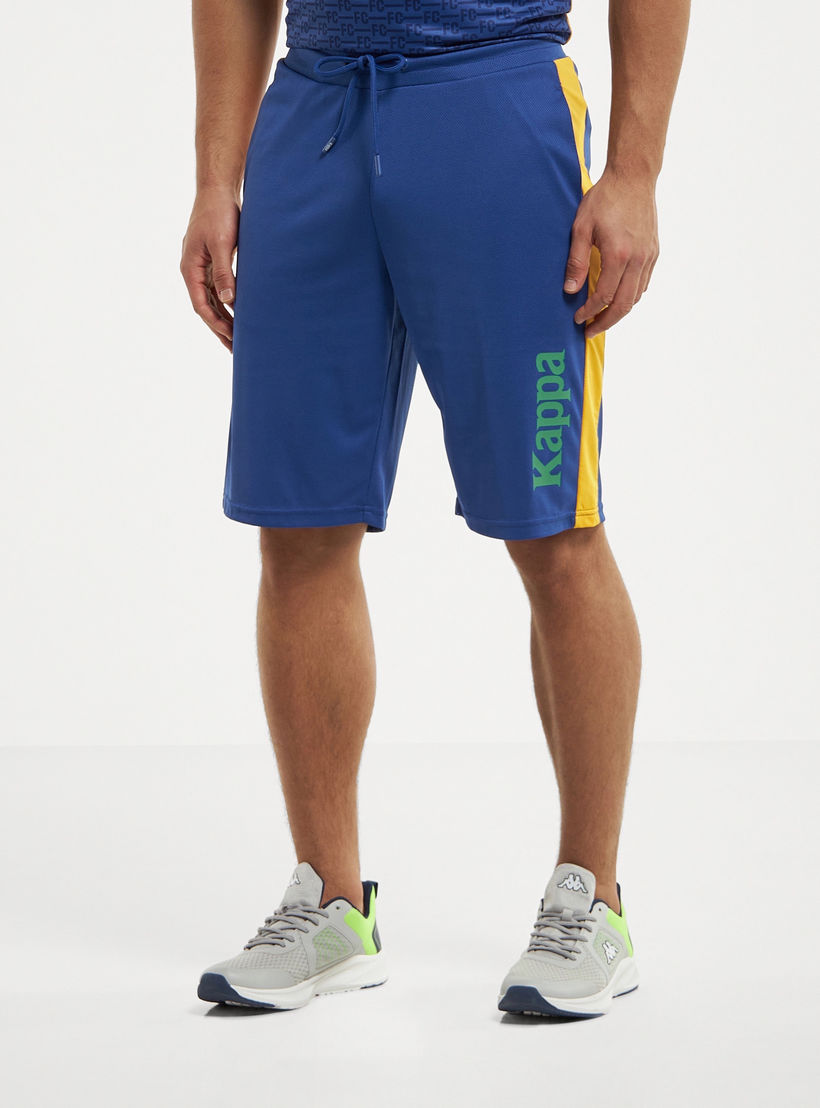 شورت بطبعات فريق لكرة القدم وجيوب من كابا-men-clothing-sportswearandactivewear-bottoms-image-4