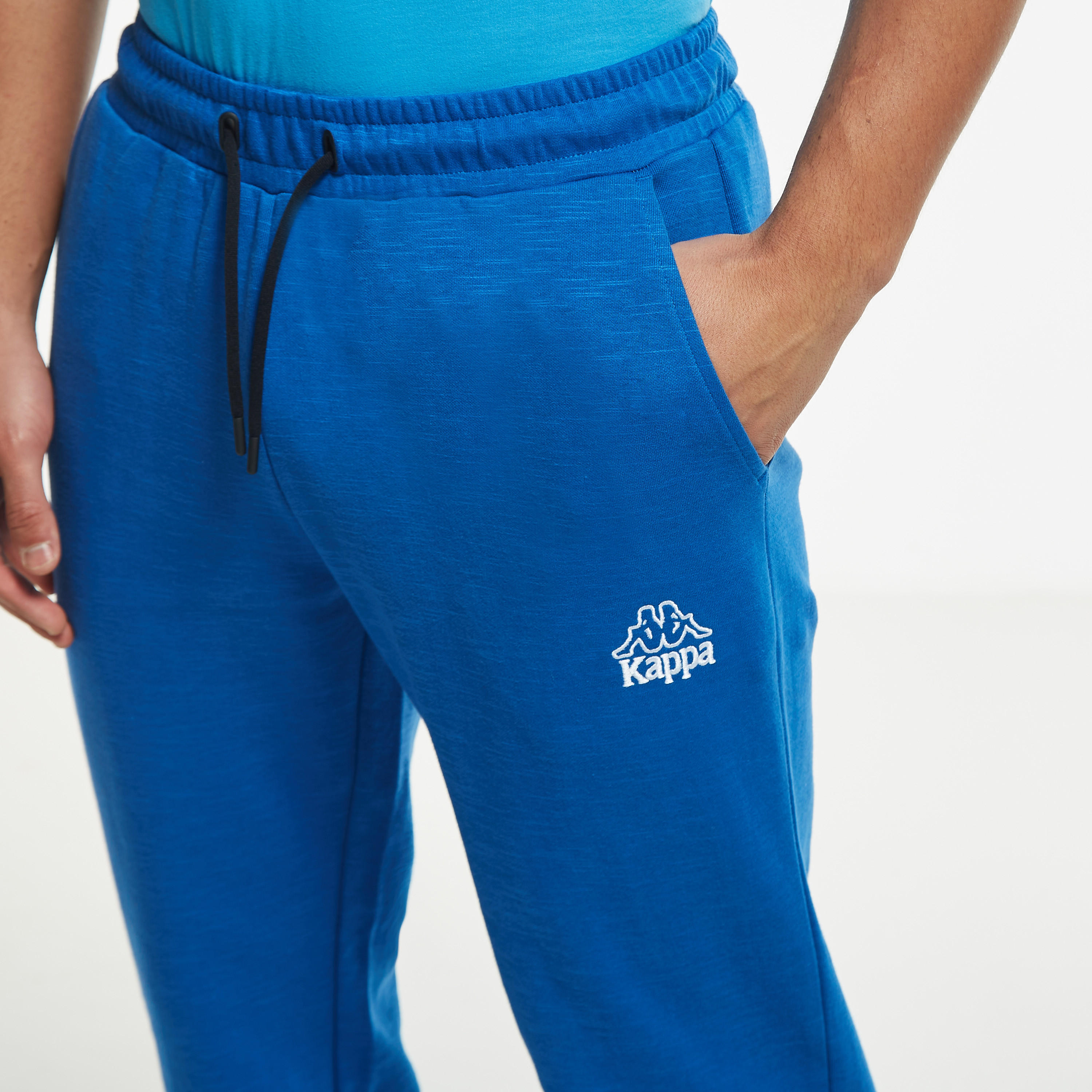 بنطلون رياضي سادة برباط إغلاق وجيوب من كابا-men-clothing-sportswearandactivewear-bottoms-image-1