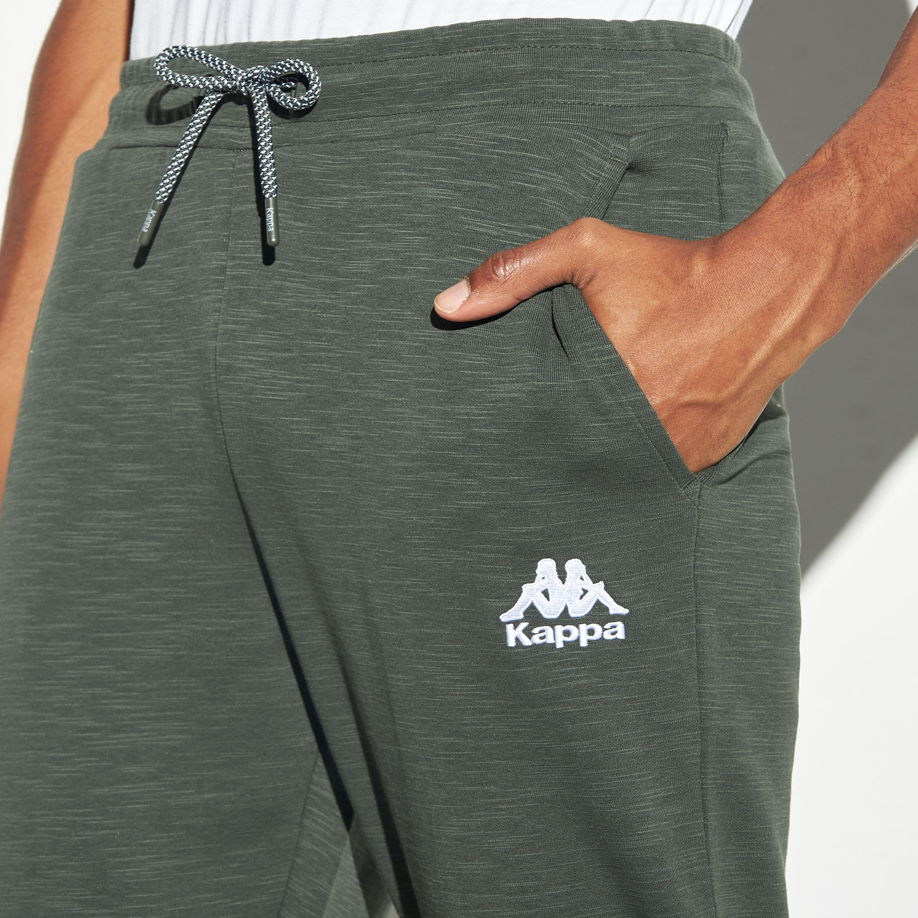 بنطلون رياضي مطرّز برباط إغلاق وجيوب من كابا-men-clothing-sportswearandactivewear-tracksuits-image-4